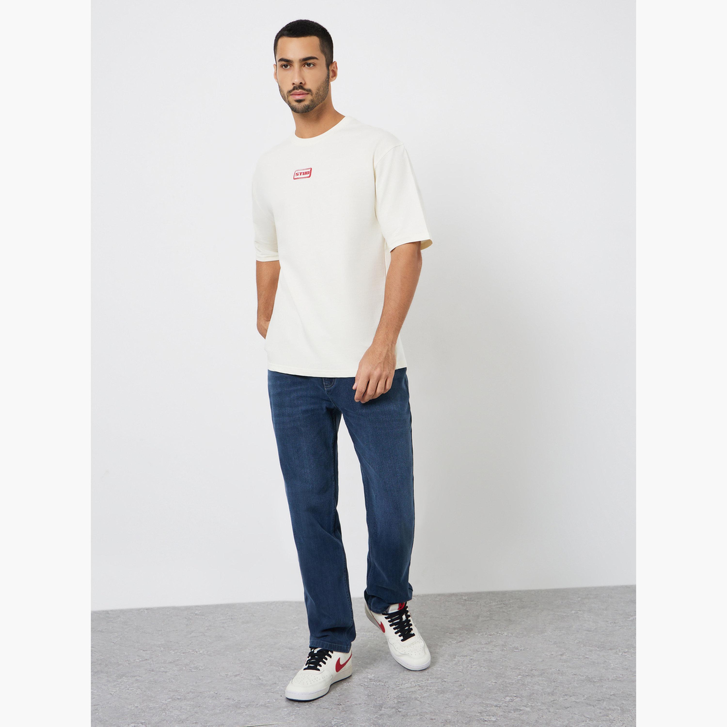 ستايلي - تي شيرت رجالي مقاس واسع برسومات غرافيكية باللون البيج-men-clothing-tshirtsandpolos-tshirts-image-2