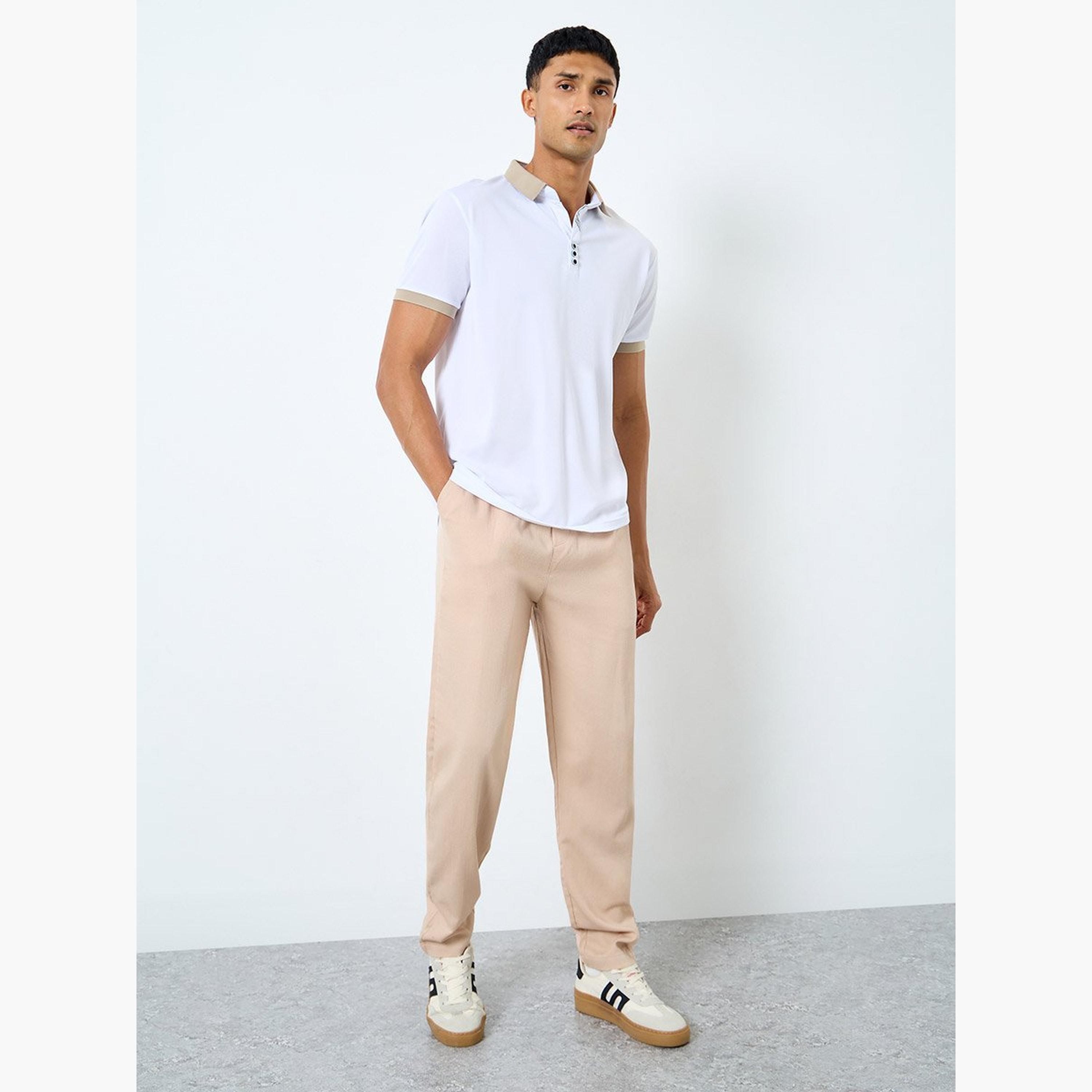 ستايلي - قميص بولو للرجال بقصّة عادية مع تفاصيل ضلع متباينة-men-clothing-sportswearandactivewear-tshirtsandpolos-image-2