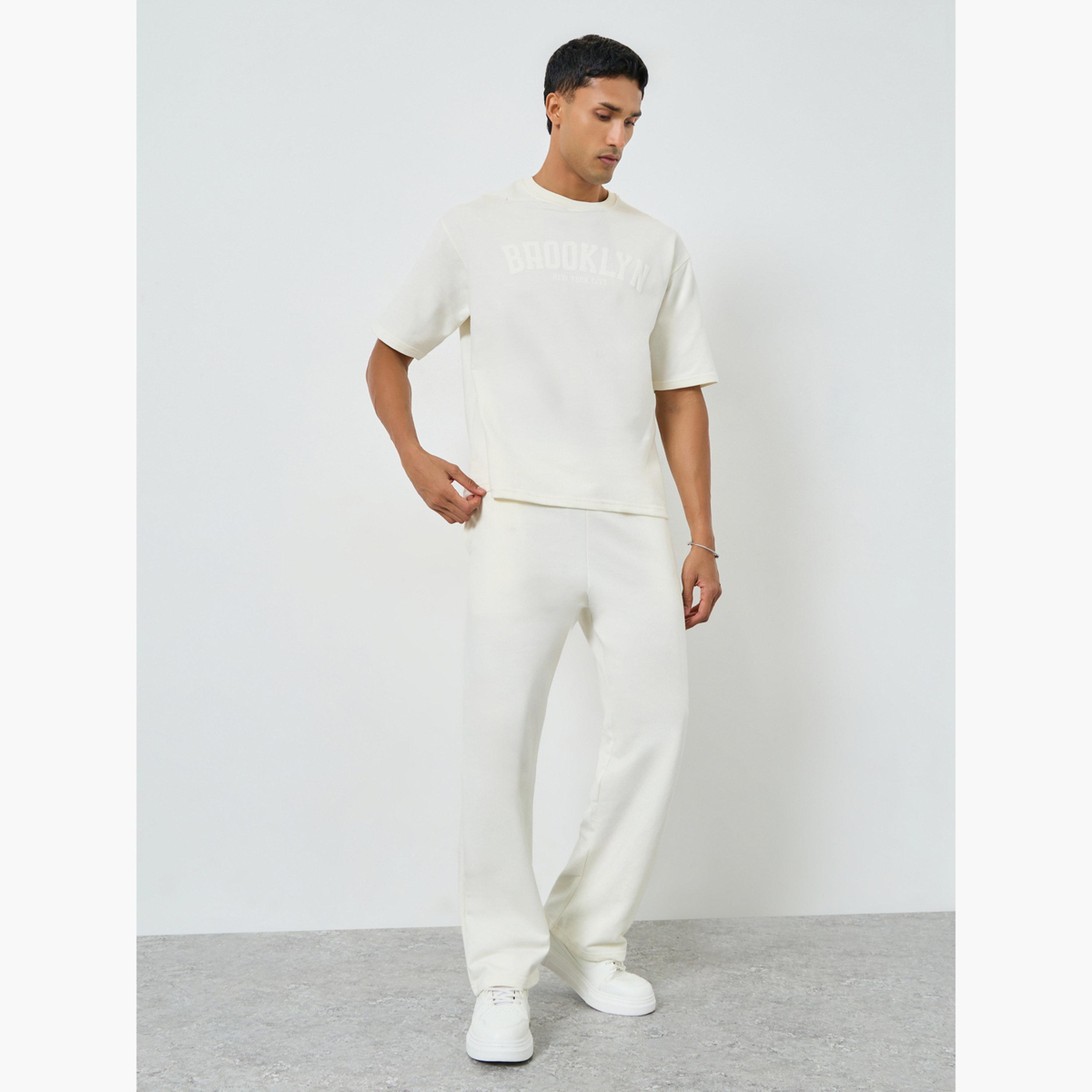 Styli Men Cream Oversized T-Shirt and Drawstring Pants Co-Ords-men-clothing-coordsets-image-1