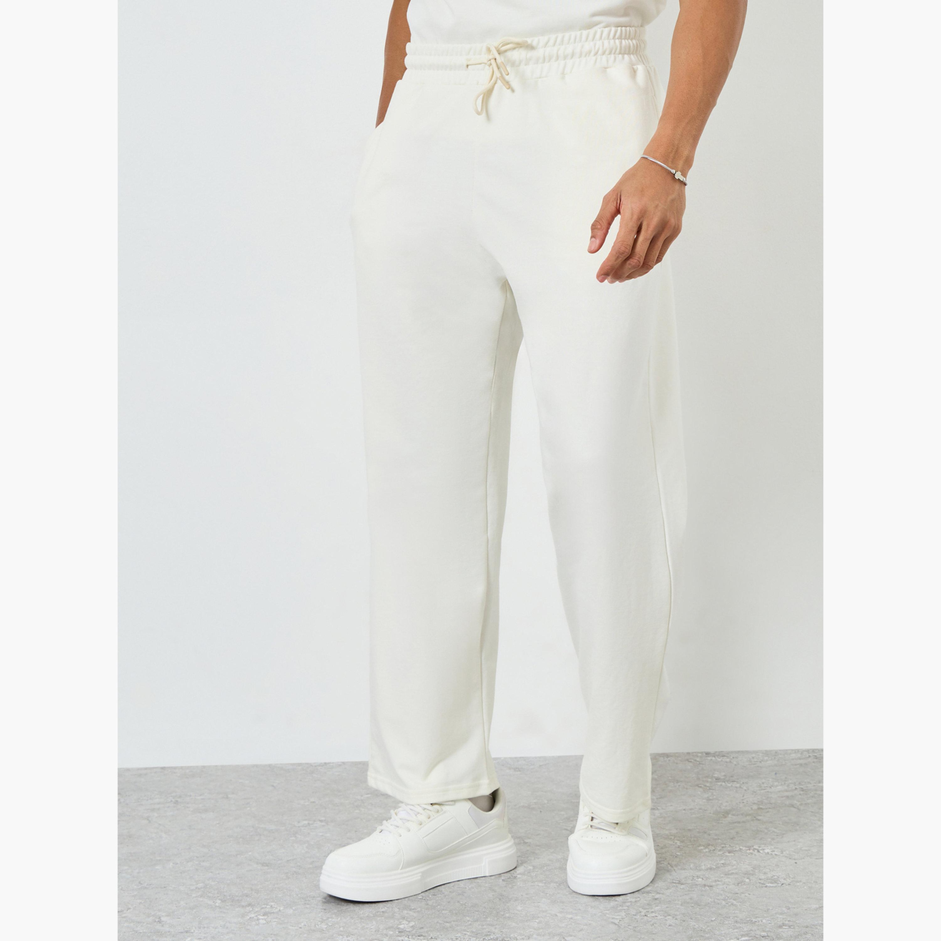 طقم منسق من تيشيرت بقصة واسعة وبنطال برباط للرجال-men-clothing-coordsets-image-5