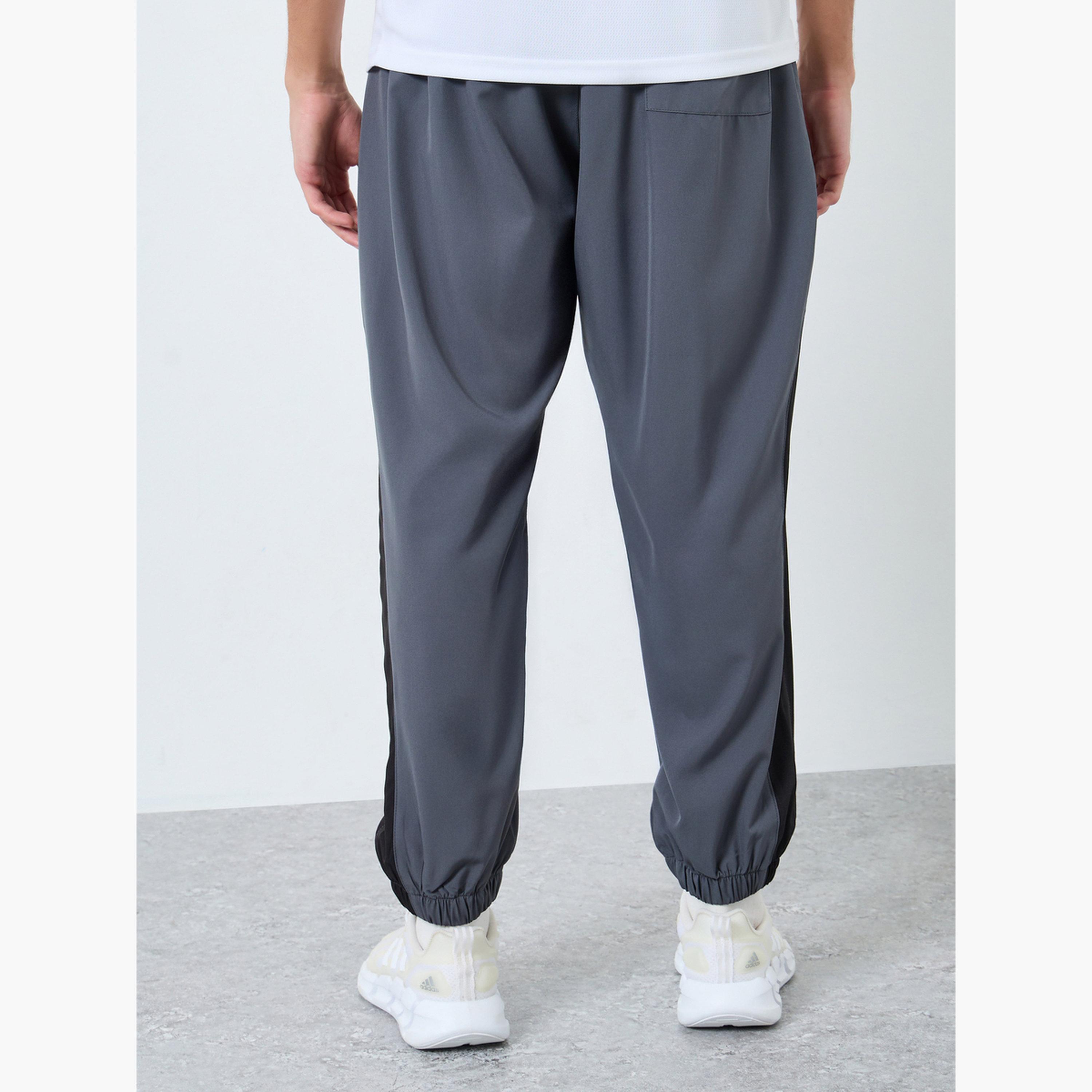 Styli Men Grey Placement Print Regular Fit Track Pants with Side Panel-men-clothing-sportswearandactivewear-bottoms-joggers-image-3