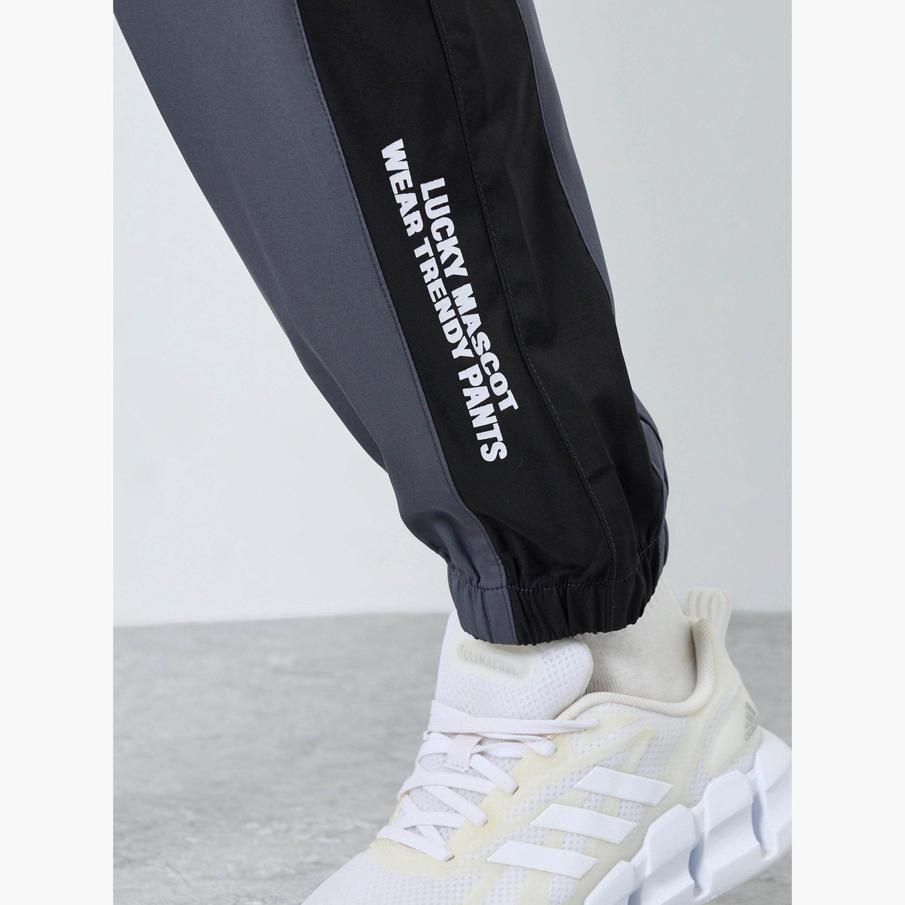Styli Men Grey Placement Print Regular Fit Track Pants with Side Panel-men-clothing-sportswearandactivewear-bottoms-joggers-image-4