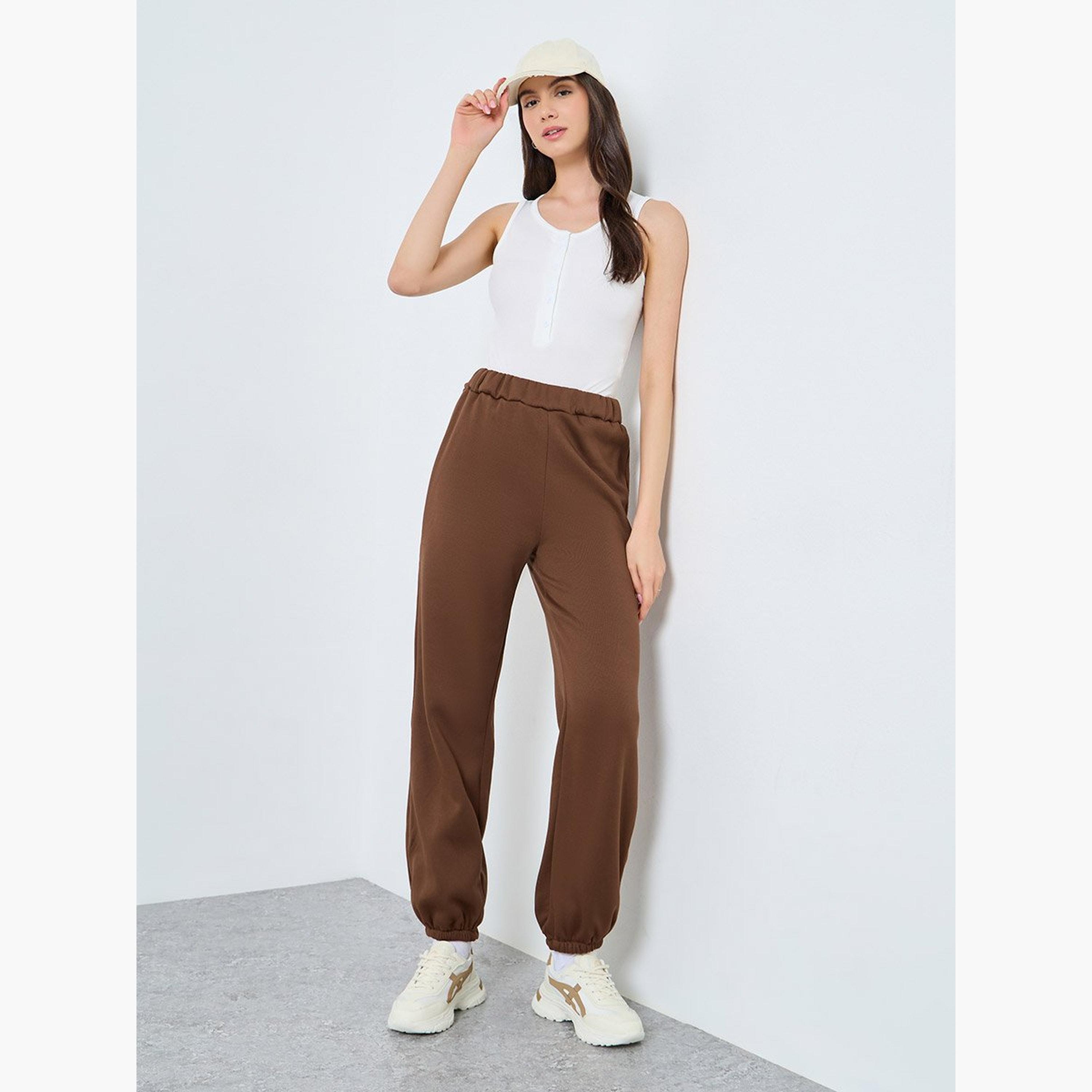 تيك تو - بنطال رياضي قصّة مريحة محبوك باللون البني-women-clothing-bottoms-joggers-image-2