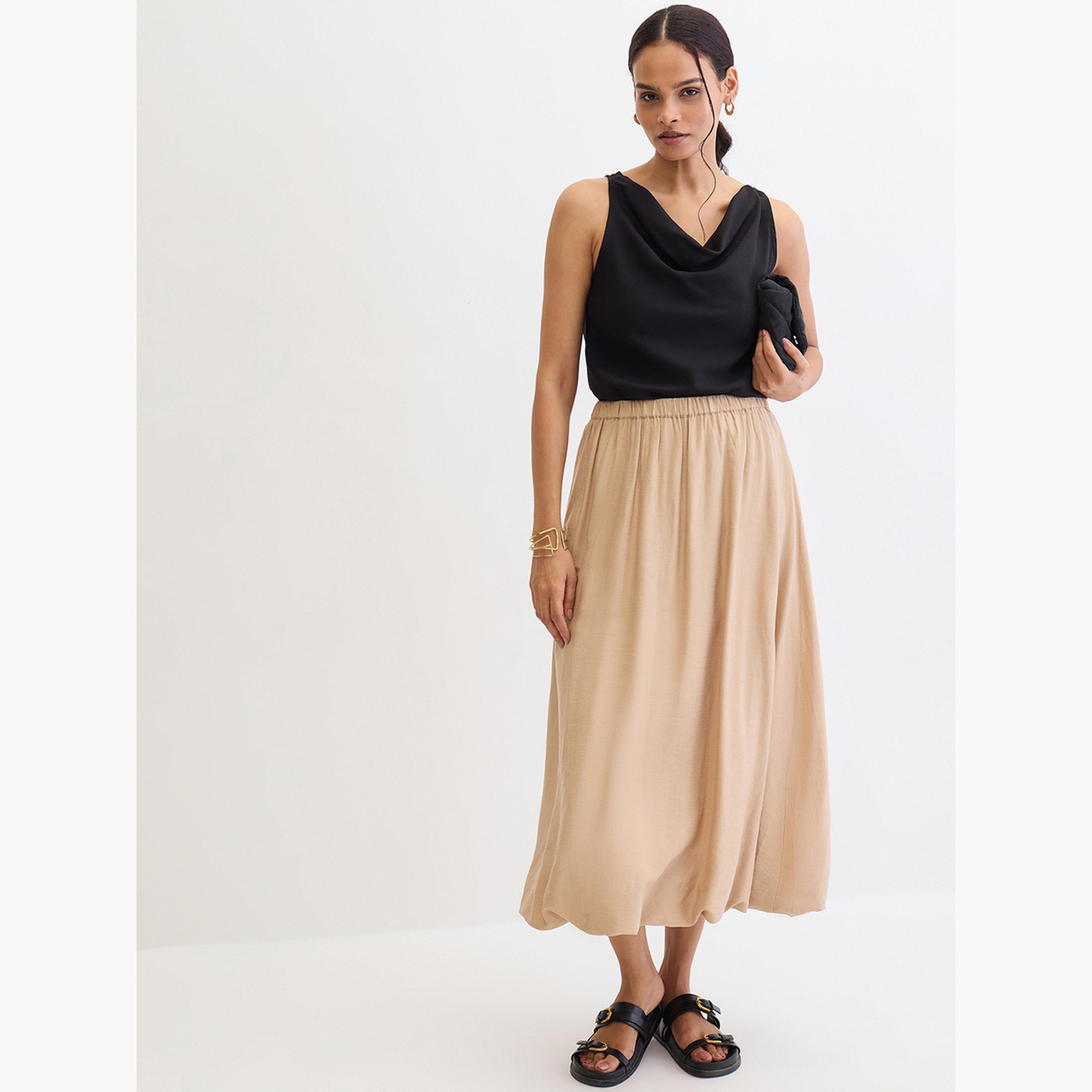 فيميلا - تنورة متوسط الطول بحافة منفوخة لون بيج-women-clothing-bottoms-skirts-image-2