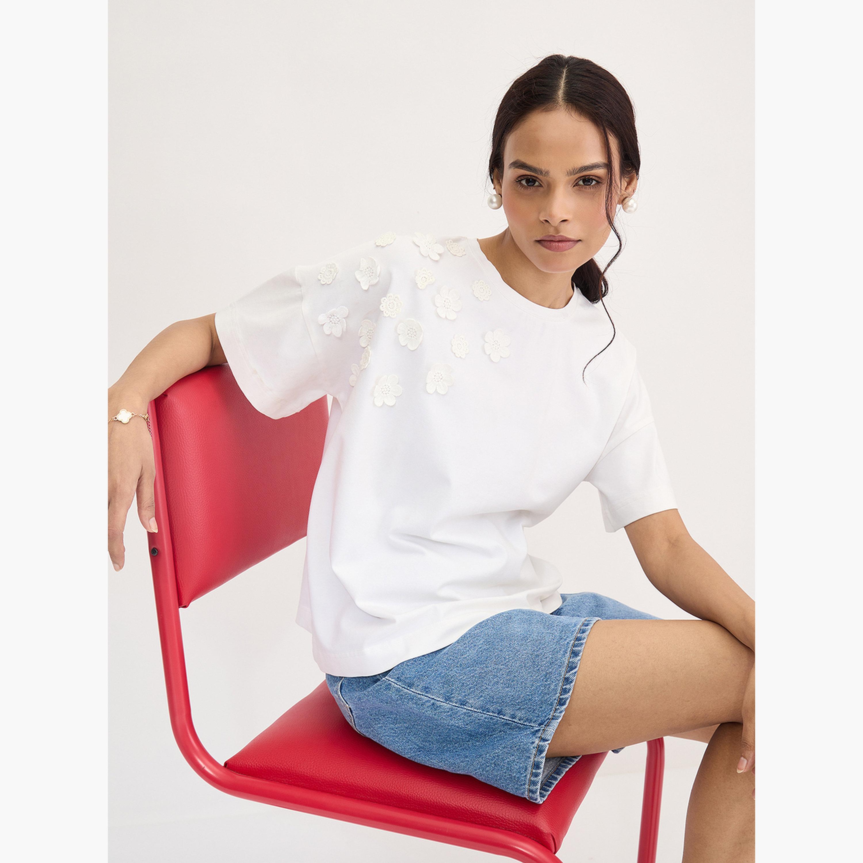 Femmella White Flower Patch Detail T-Shirt-women-clothing-tshirts-image-4