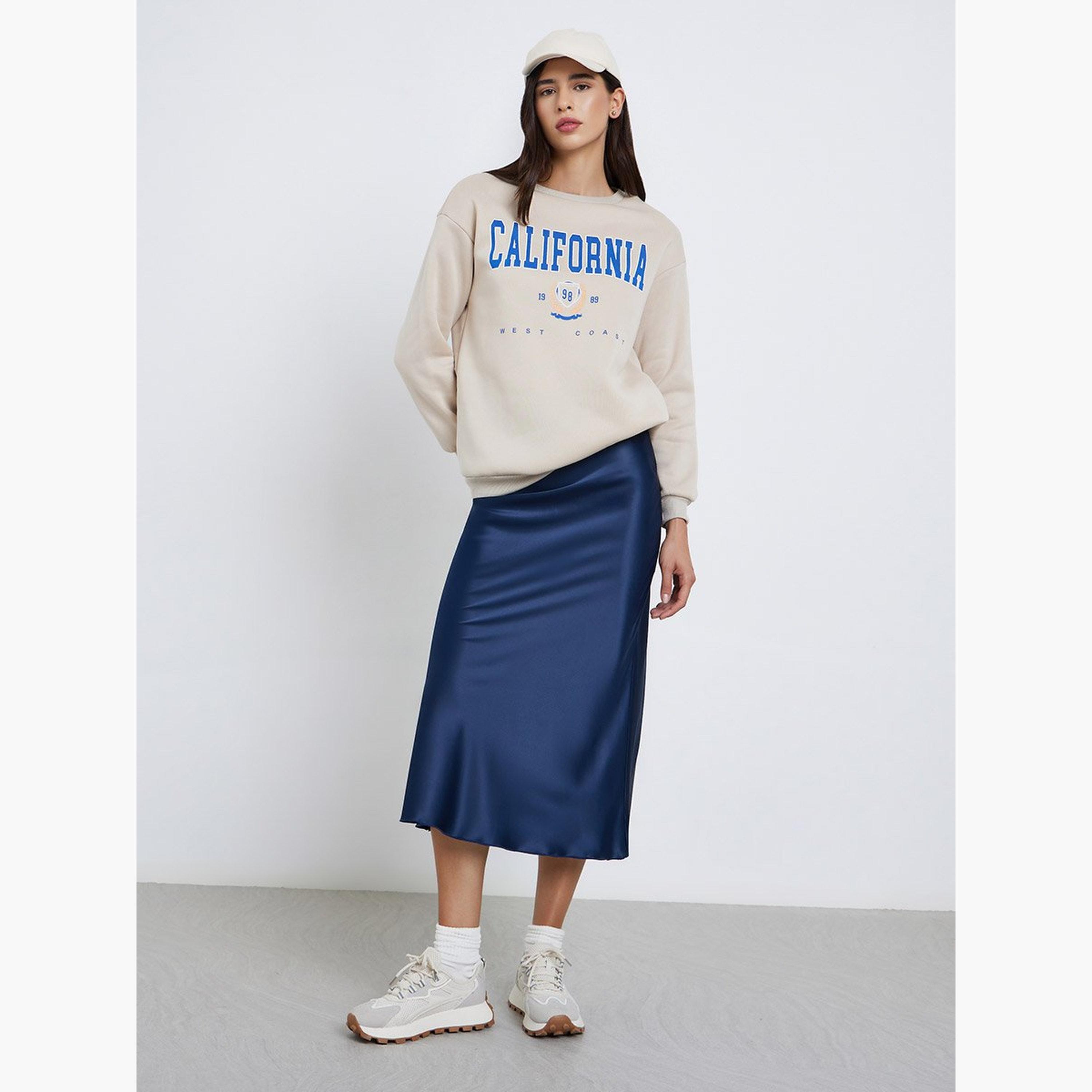 تيك تو - سويت شيرت قصّة مريحة بطبعة كاليفورنيا باللون البيج-women-clothing-hoodiesandsweatshirts-sweatshirts-image-2