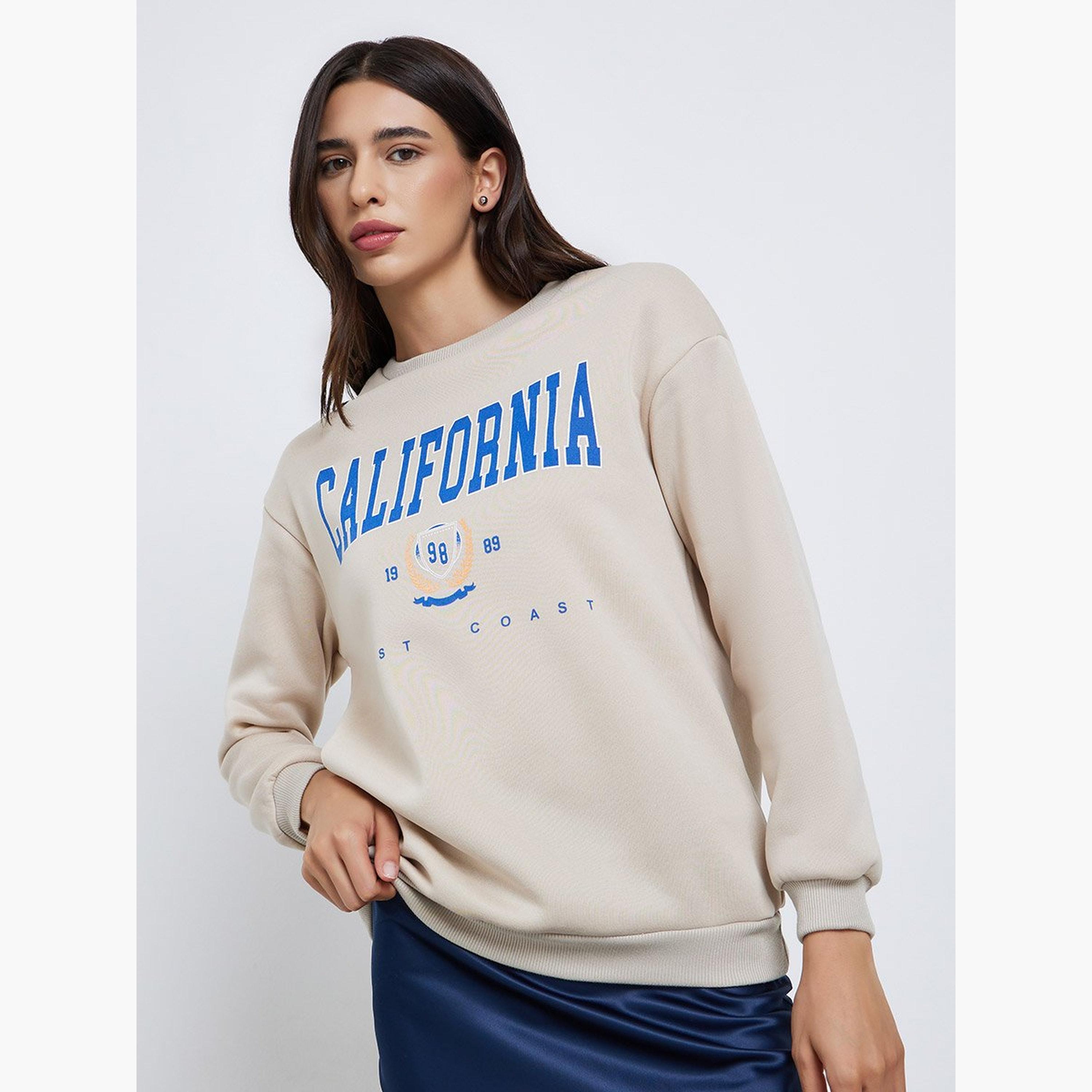 تيك تو - سويت شيرت قصّة مريحة بطبعة كاليفورنيا باللون البيج-women-clothing-hoodiesandsweatshirts-sweatshirts-image-3