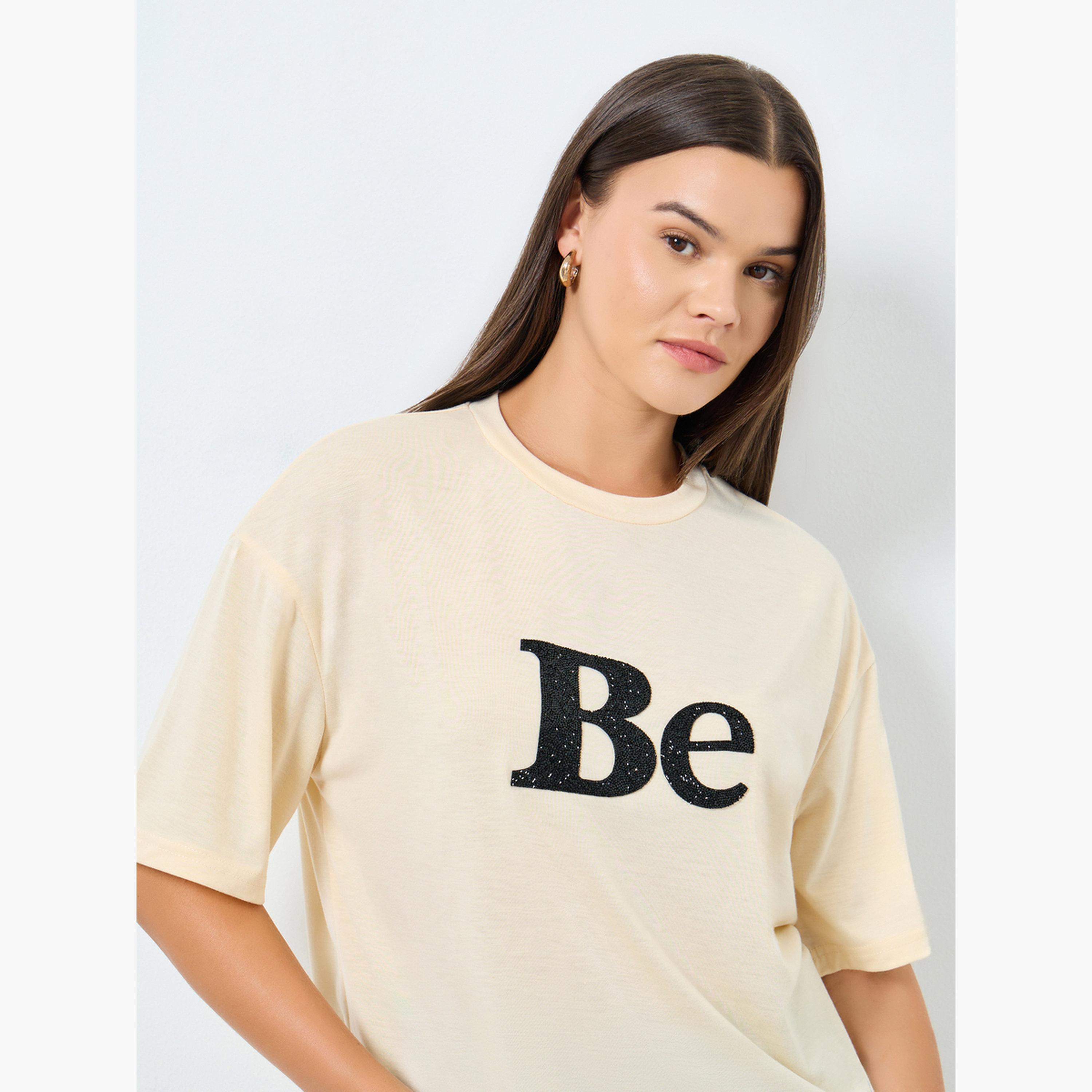 Styli Beige Oversized Embellished Slogan T-Shirt-women-clothing-tshirts-image-3