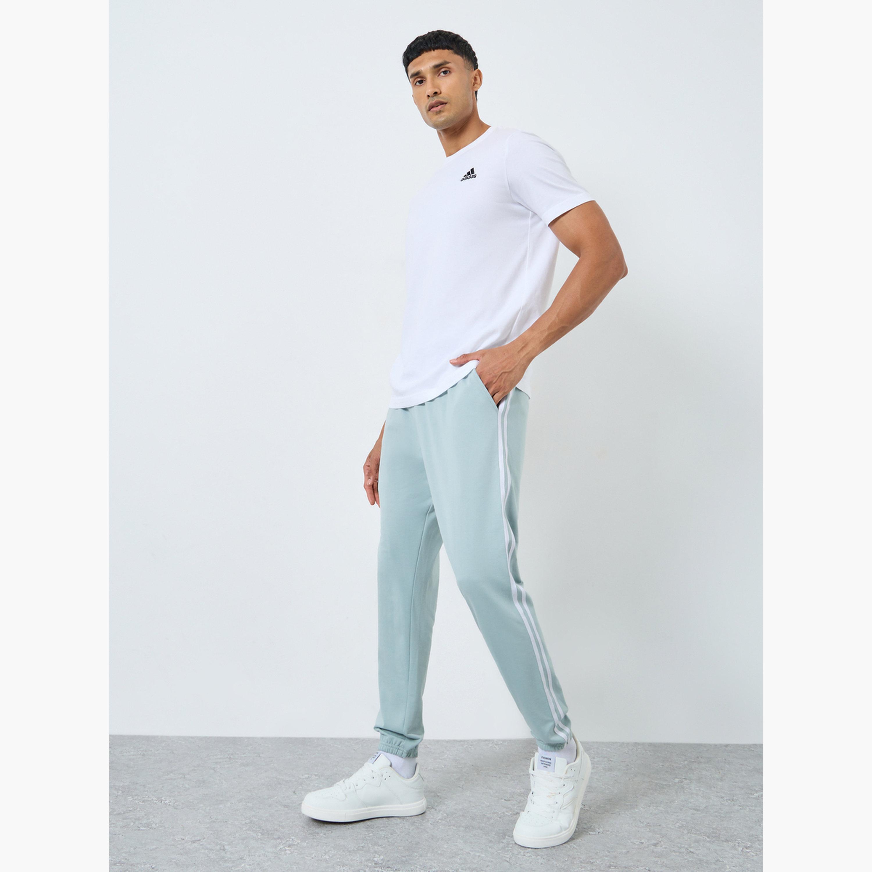 ستايلي - بنطال رياضي رجالي ضيق من تيري مع شريط جانبي-men-clothing-bottoms-joggers-image-2