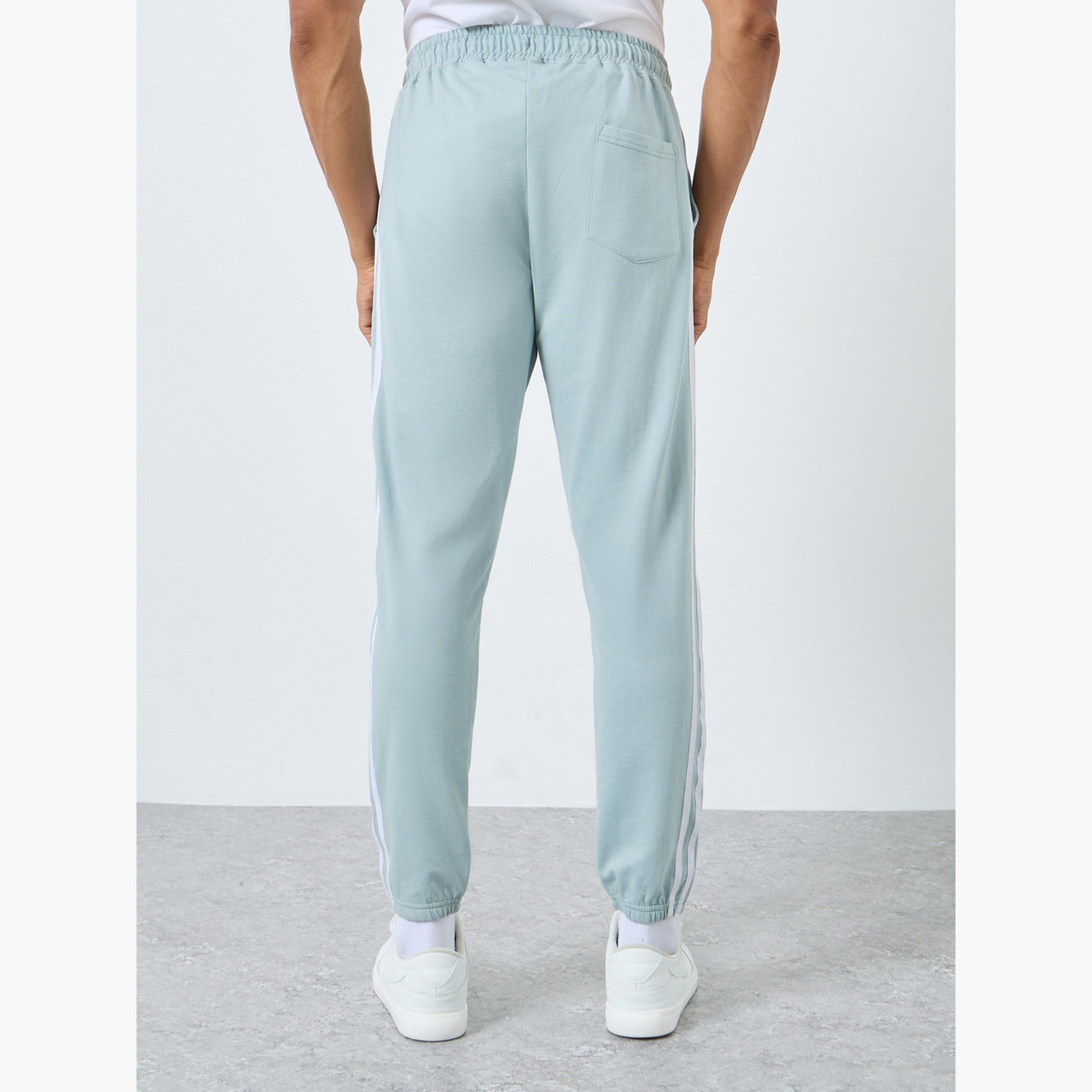 ستايلي - بنطال رياضي رجالي ضيق من تيري مع شريط جانبي-men-clothing-bottoms-joggers-image-4
