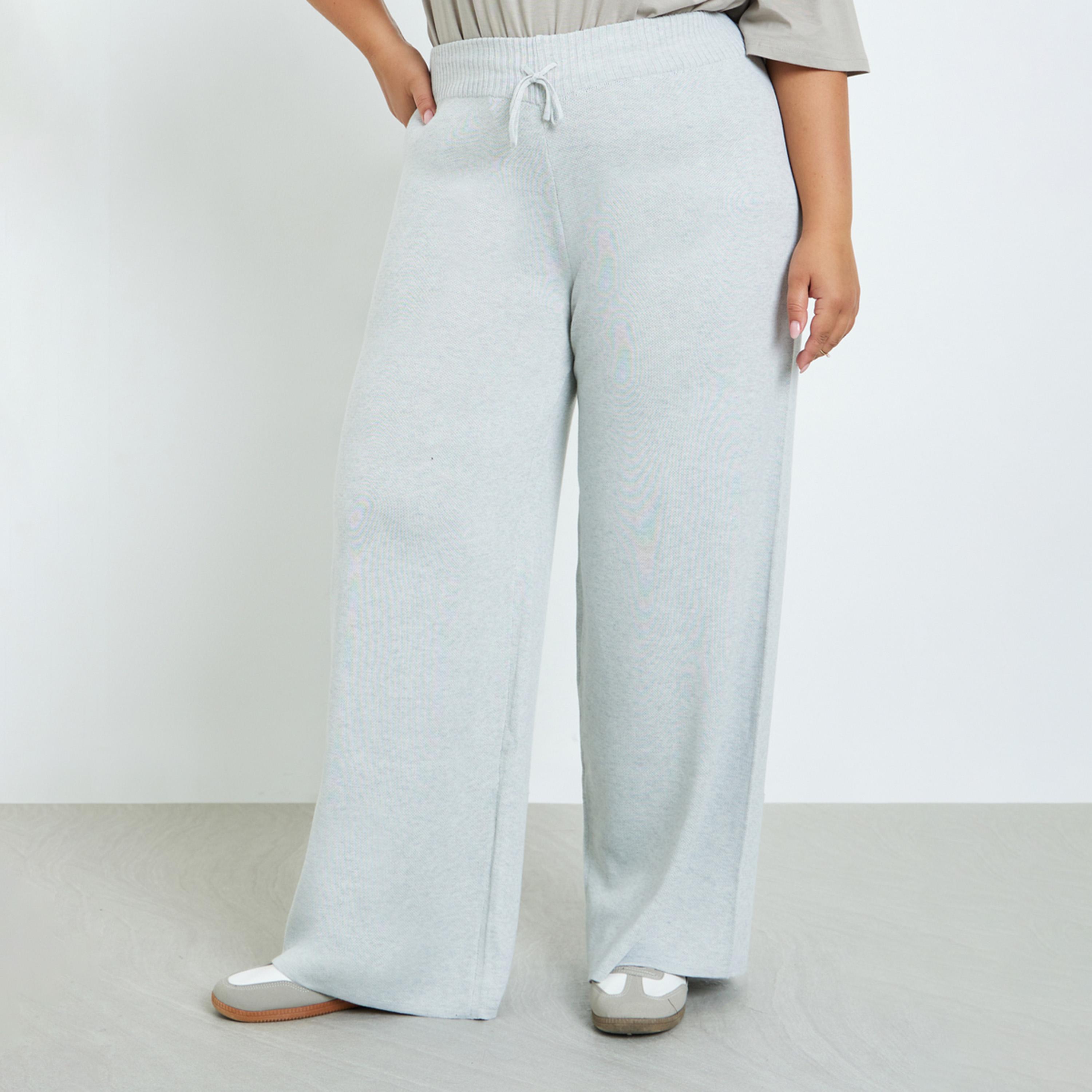 Styli Plus Size Grey Flared Trousers-women-clothing-bottoms-trousers-image-1