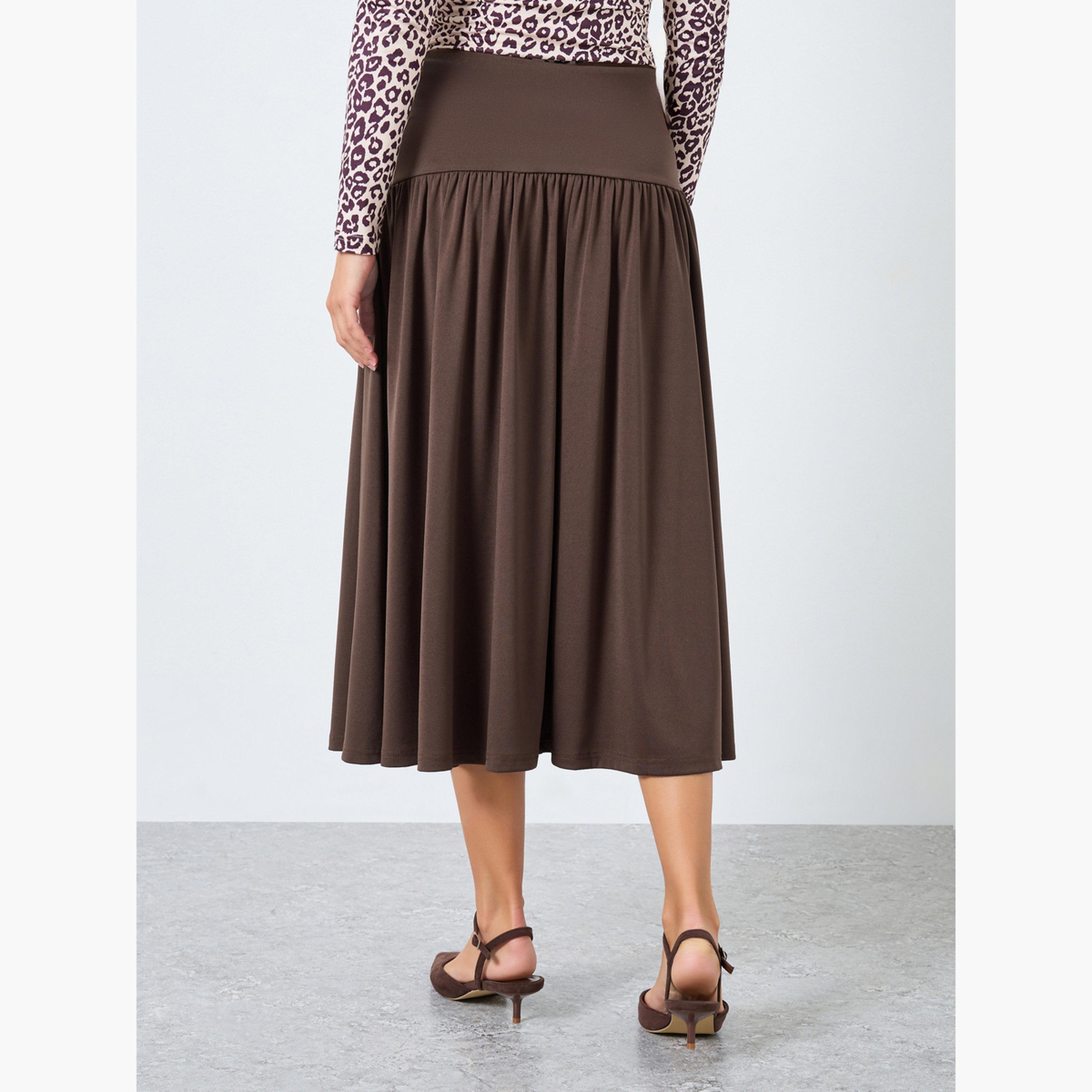 ستايلي - تنورة متوسطة الطول بنية اللون بخصر منسدل-women-clothing-bottoms-skirts-image-3