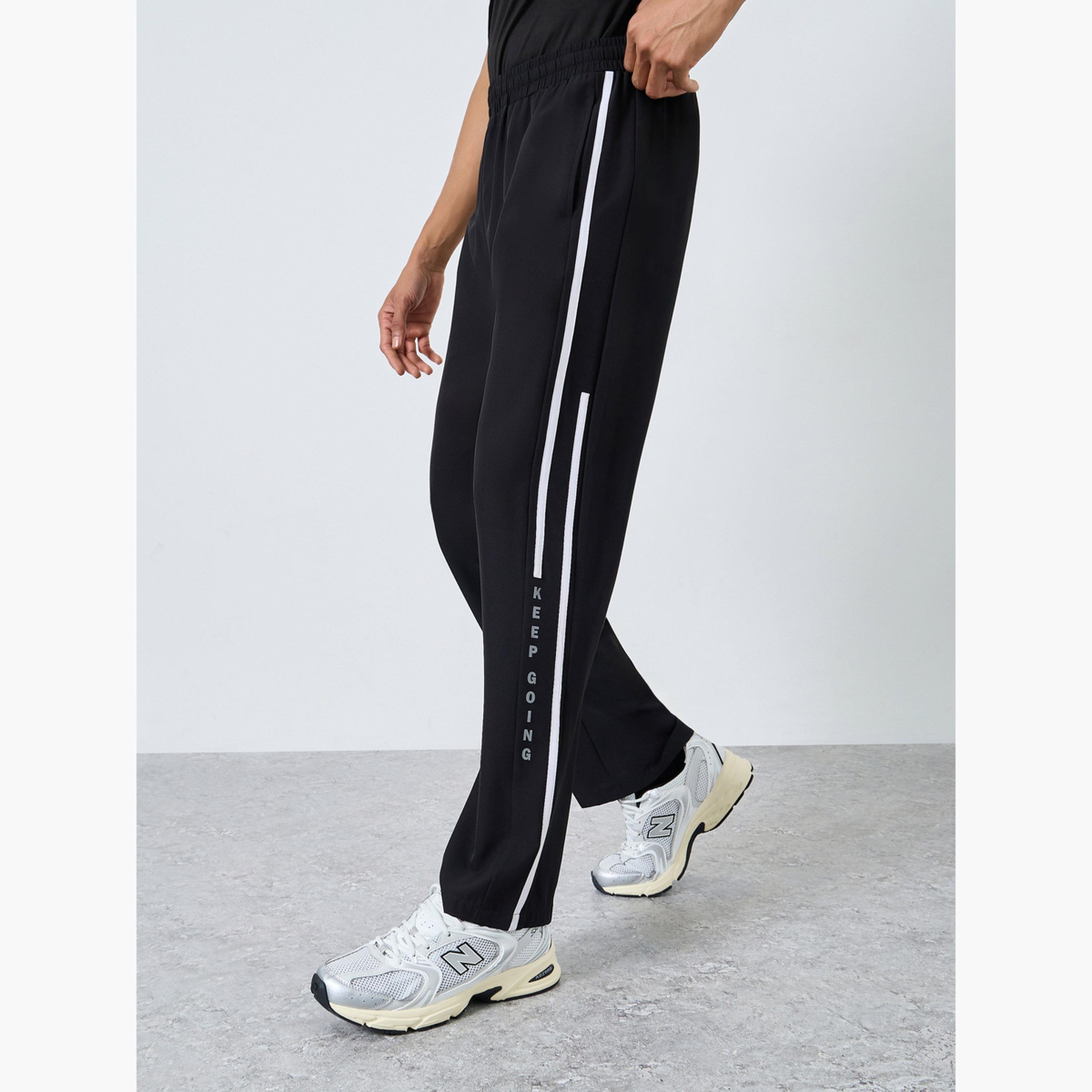 Styli Athleisure Track Pants With Side Panel and Print Detail-men-clothing-sportswearandactivewear-bottoms-joggers-image-1