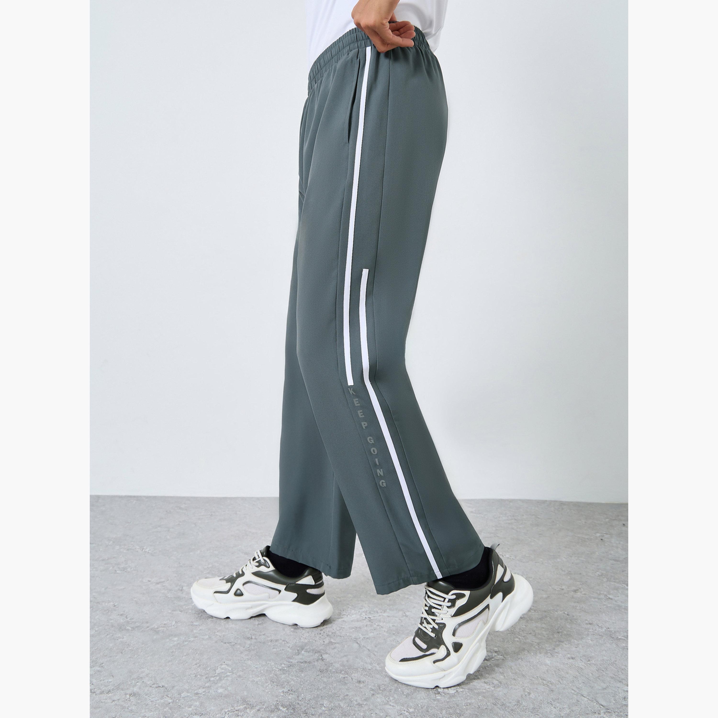 Styli Athleisure Track Pants with Side Panel and Print Detail-men-clothing-sportswearandactivewear-bottoms-joggers-image-1