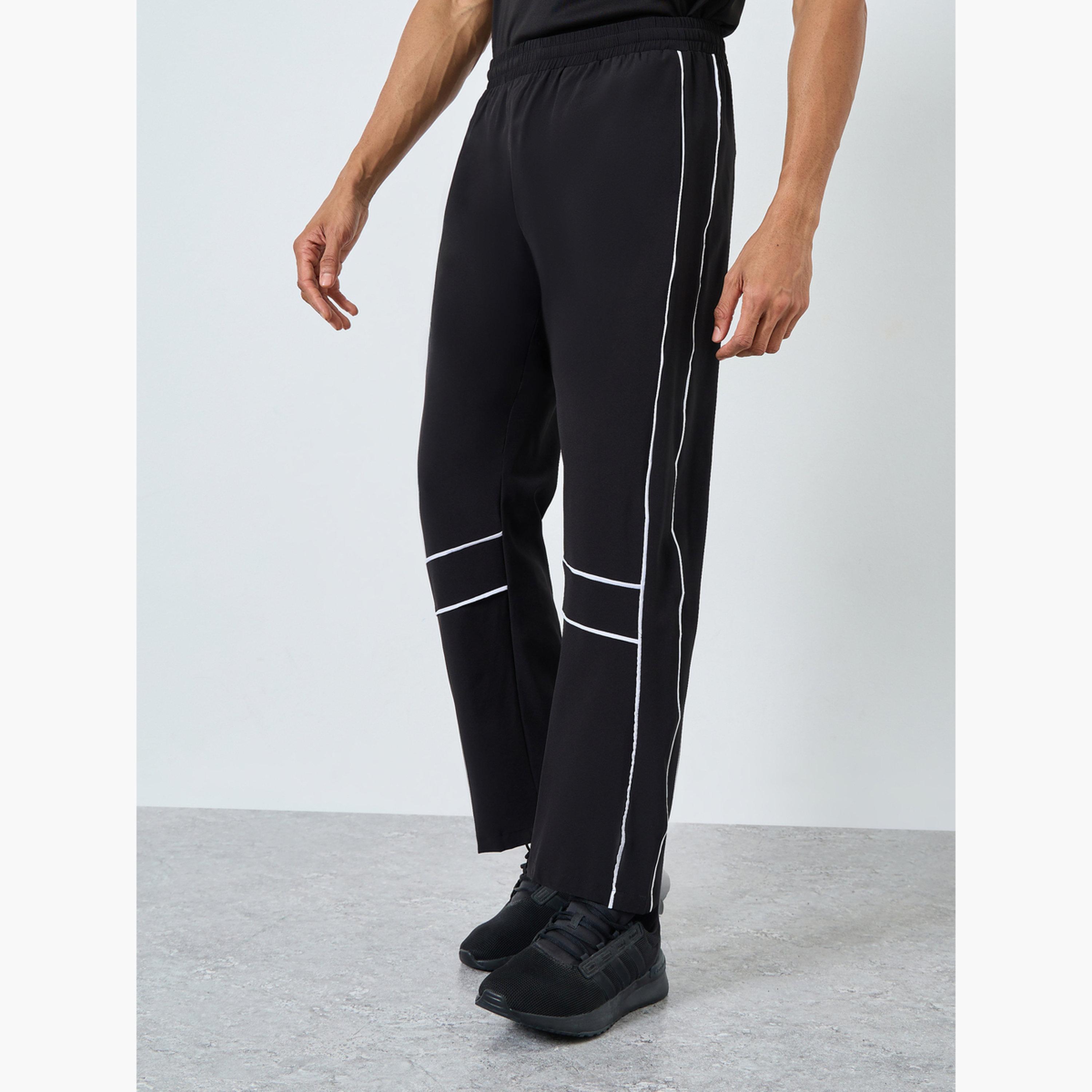 Styli Athleisure Track Pants with Piping Detail-men-clothing-sportswearandactivewear-bottoms-joggers-image-1