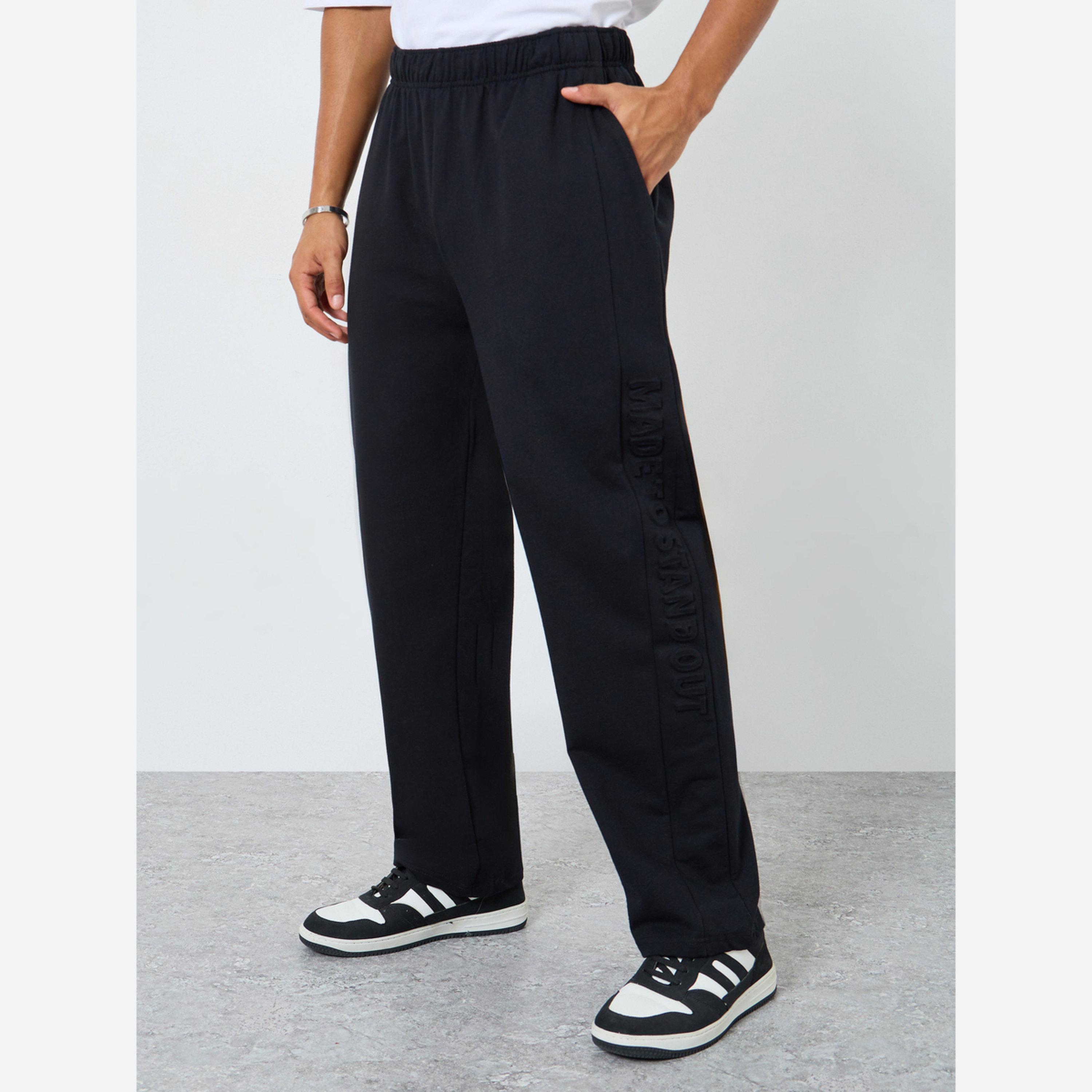 Styli Men Black Terry Joggers with Embossed Detail-men-clothing-bottoms-joggers-image-1