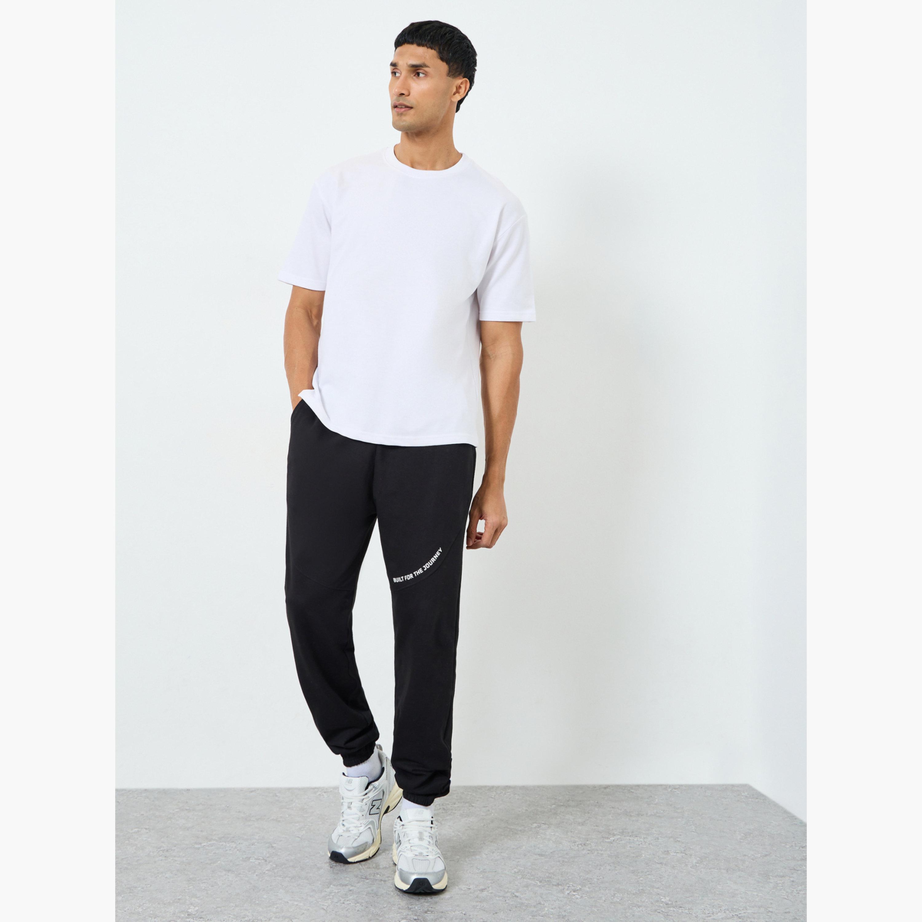 طقم قميص بأزرار وبنطلون-men-clothing-bottoms-joggers-image-2