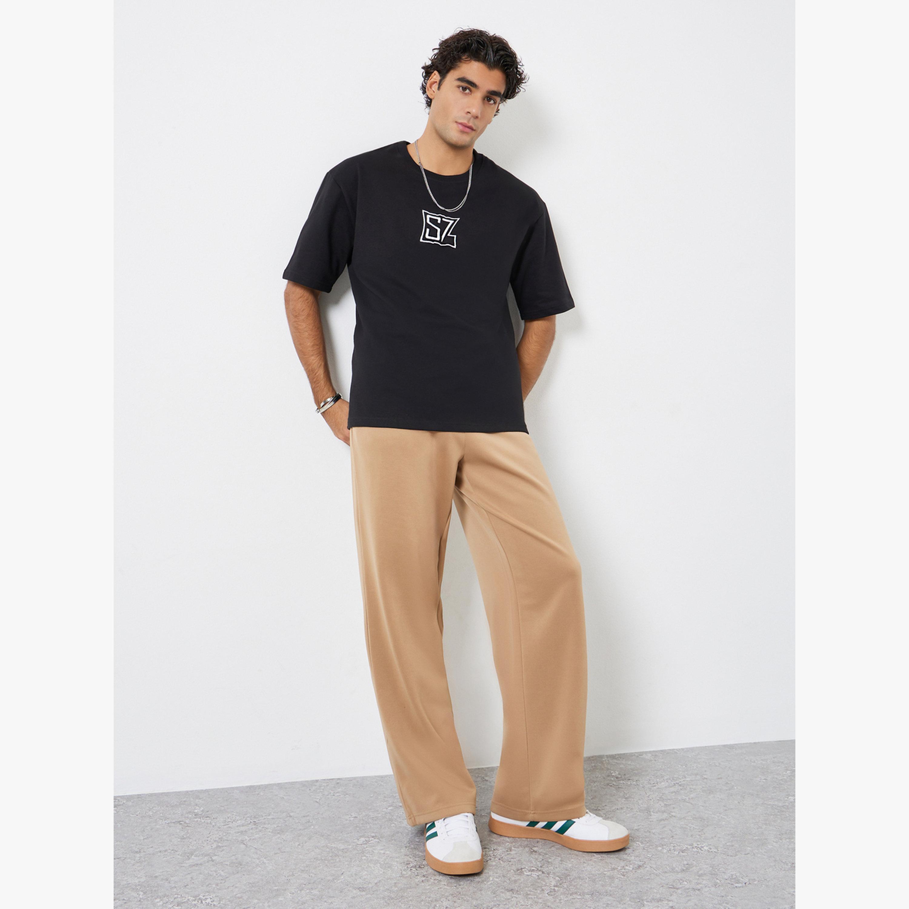 تيشيرت تيري واسع بتفاصيل مُطرّزة-men-clothing-tshirtsandpolos-tshirts-image-2