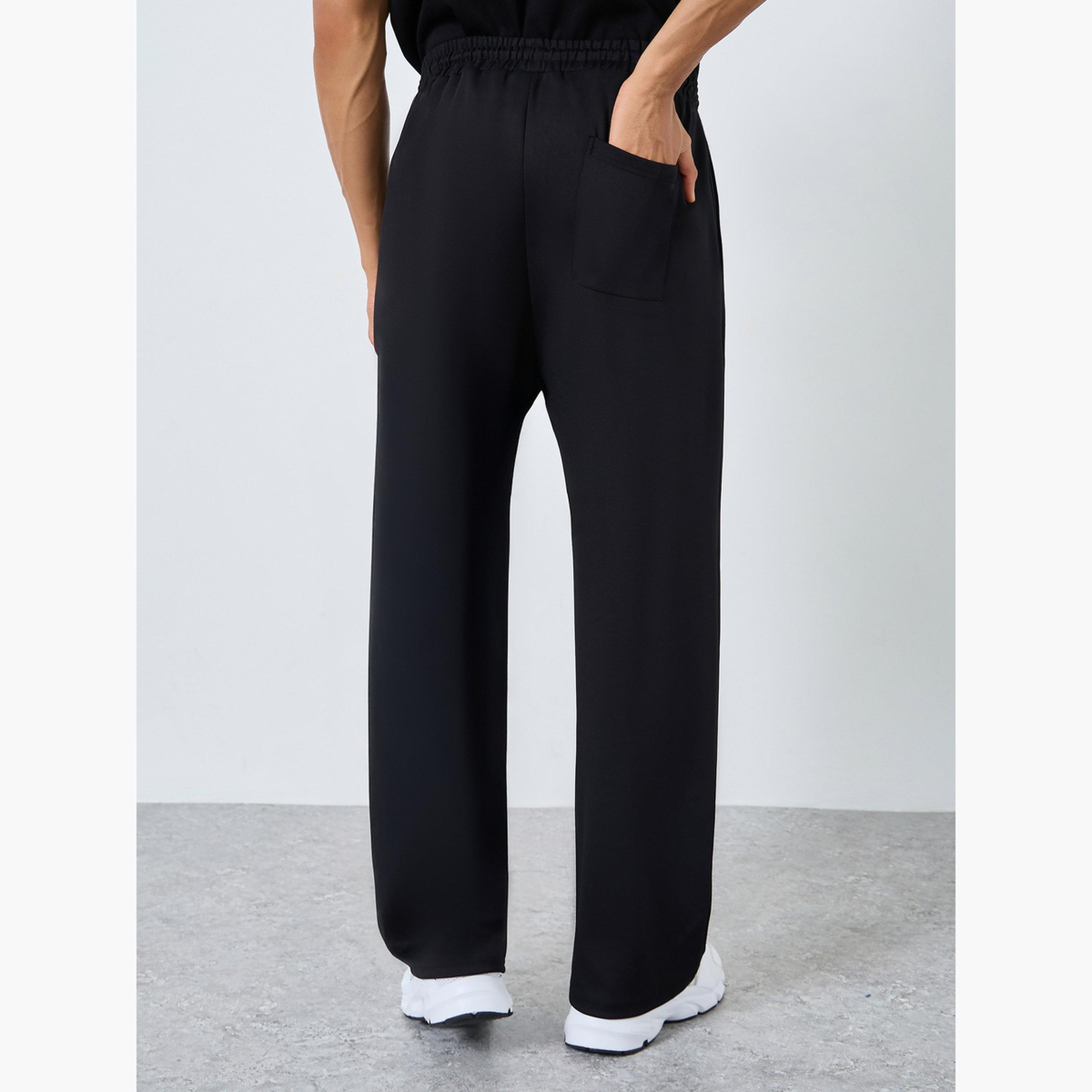 بنطال جوغر واسع أسود بتفاصيل شارة للرجال-men-clothing-bottoms-joggers-image-4