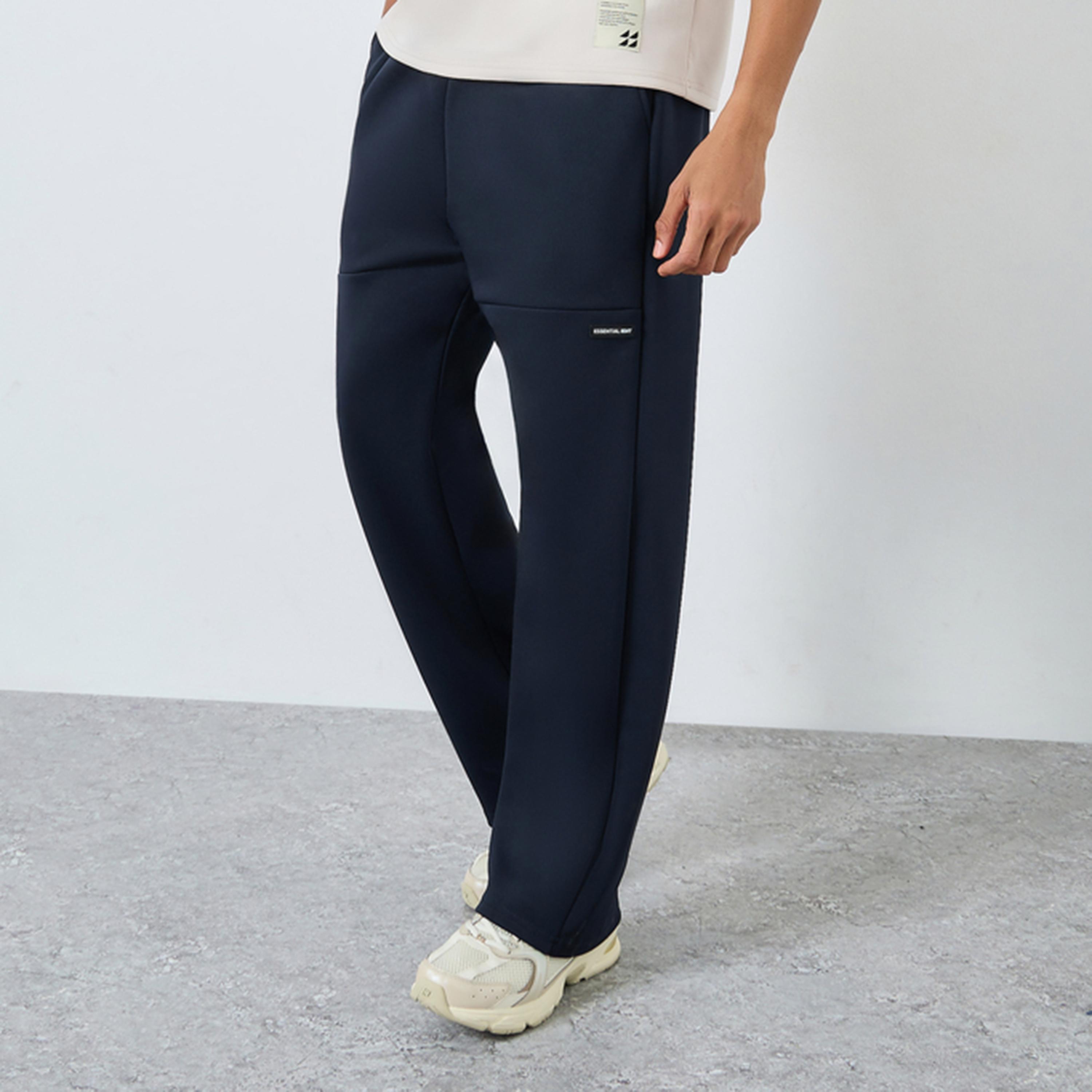 بنطال جوغر واسع كحلي بتفاصيل شارة للرجال-men-clothing-bottoms-joggers-image-1