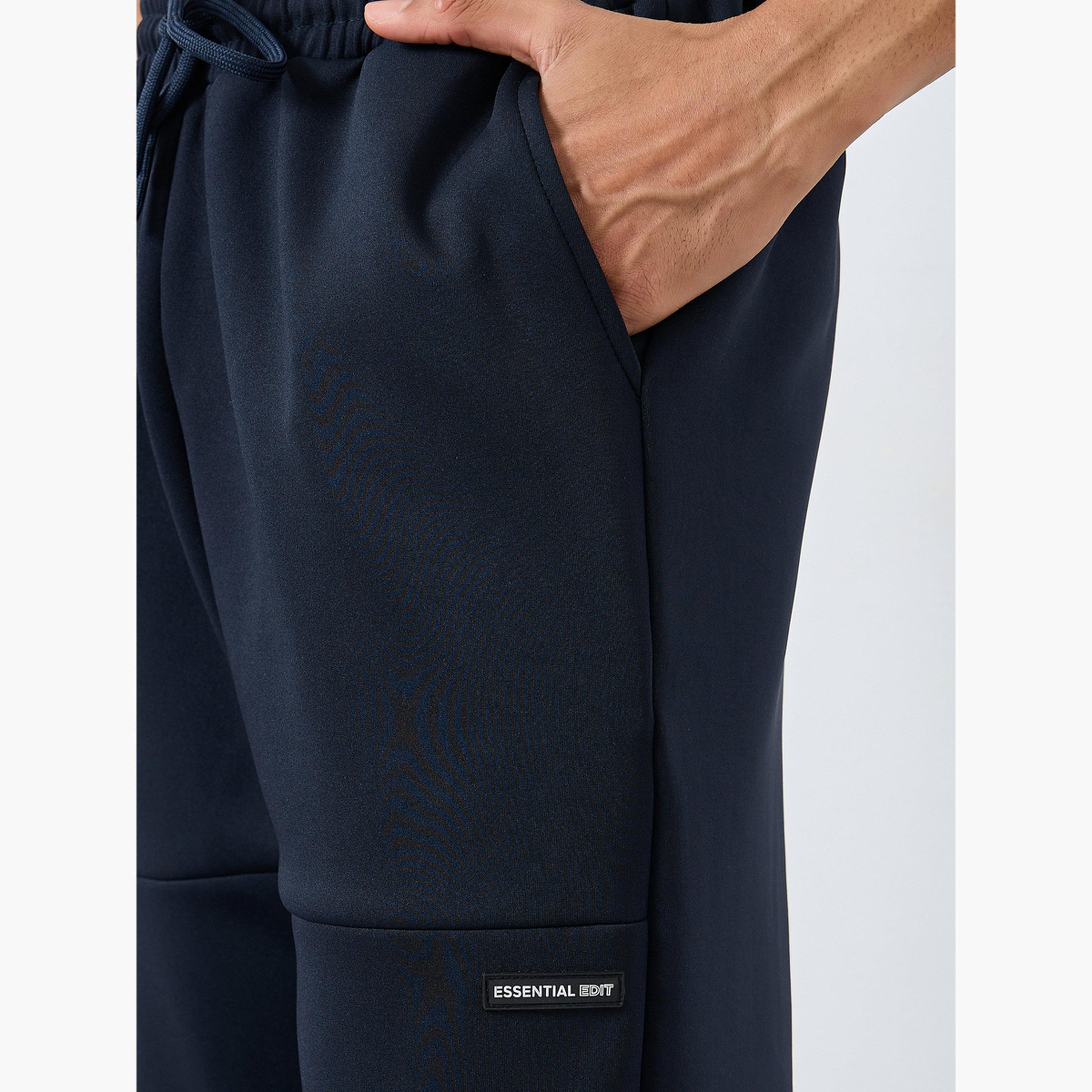 بنطال جوغر واسع كحلي بتفاصيل شارة للرجال-men-clothing-bottoms-joggers-image-2