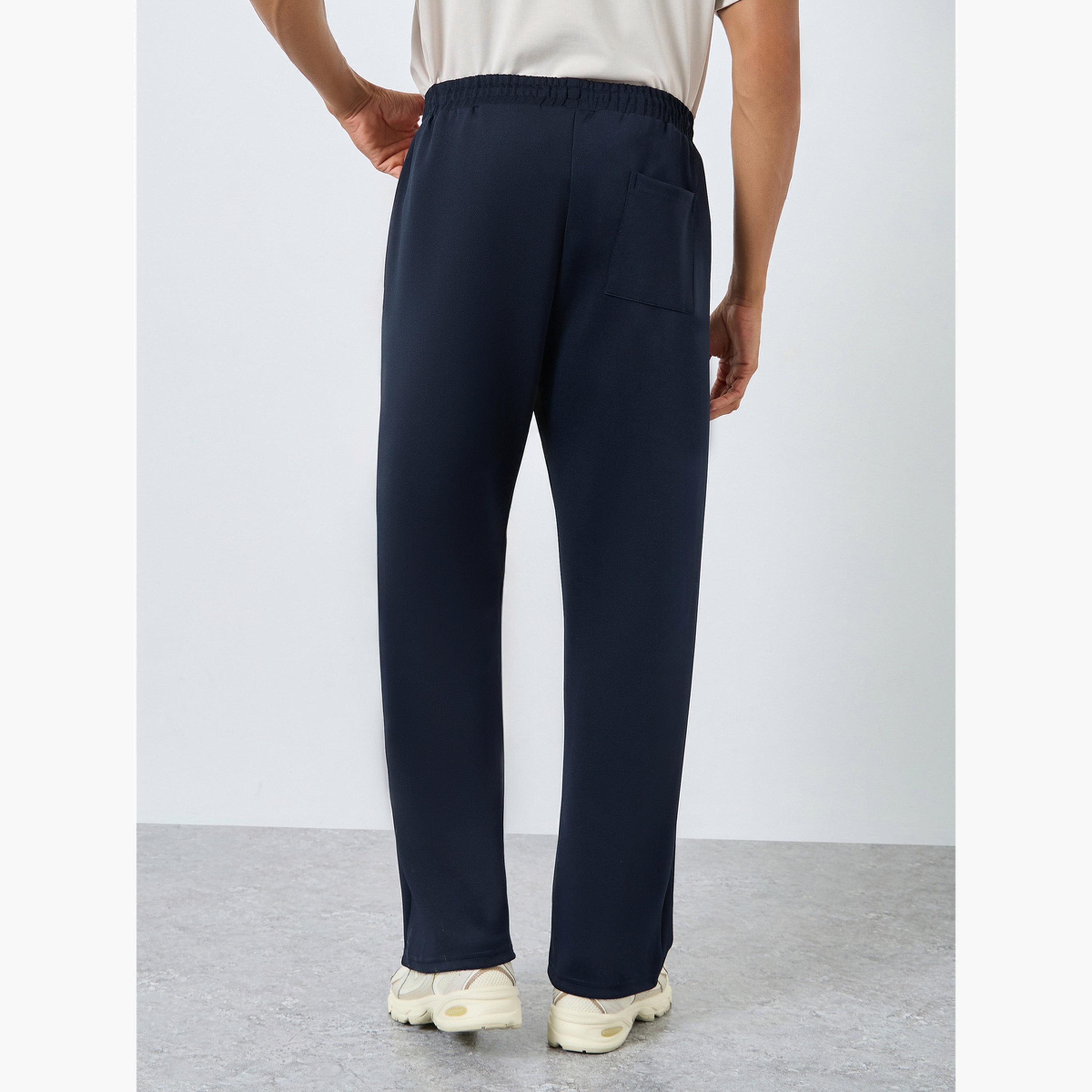 بنطال جوغر واسع كحلي بتفاصيل شارة للرجال-men-clothing-bottoms-joggers-image-3