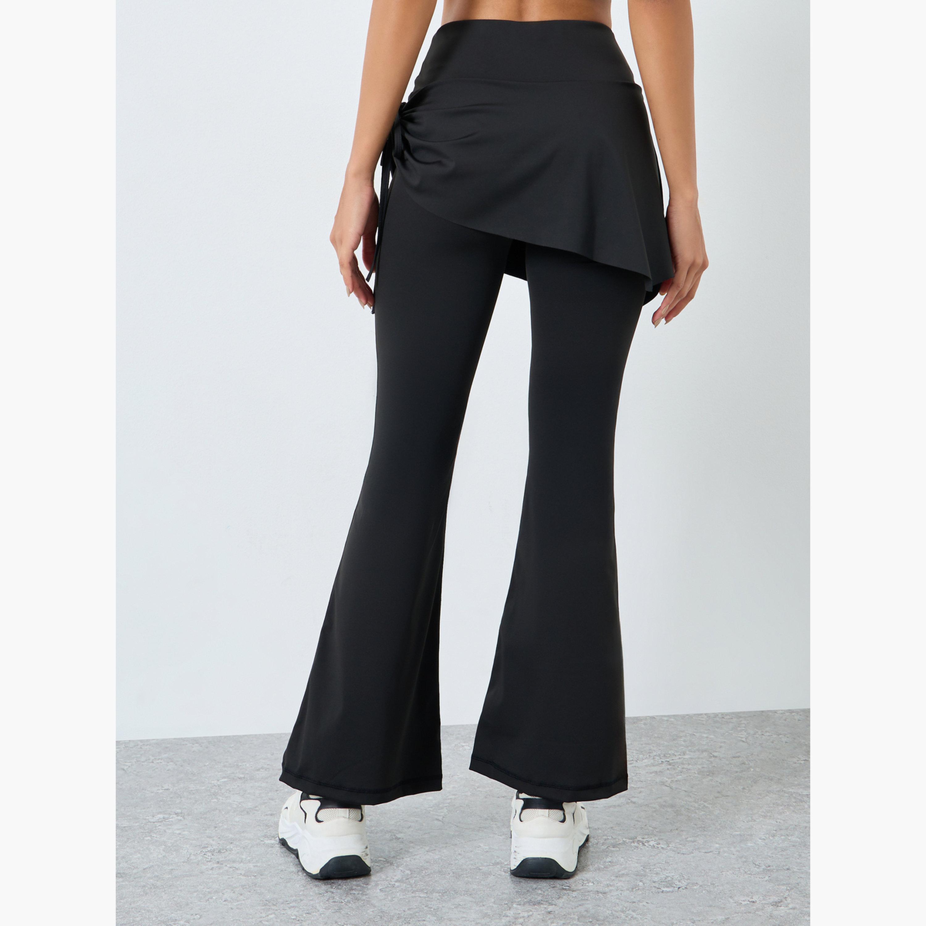 ستايلي - بنطال واسع تصميم 2 في 1 مع تنورة جانبية مكشكشة-women-clothing-sportswearandactivewear-bottoms-image-3