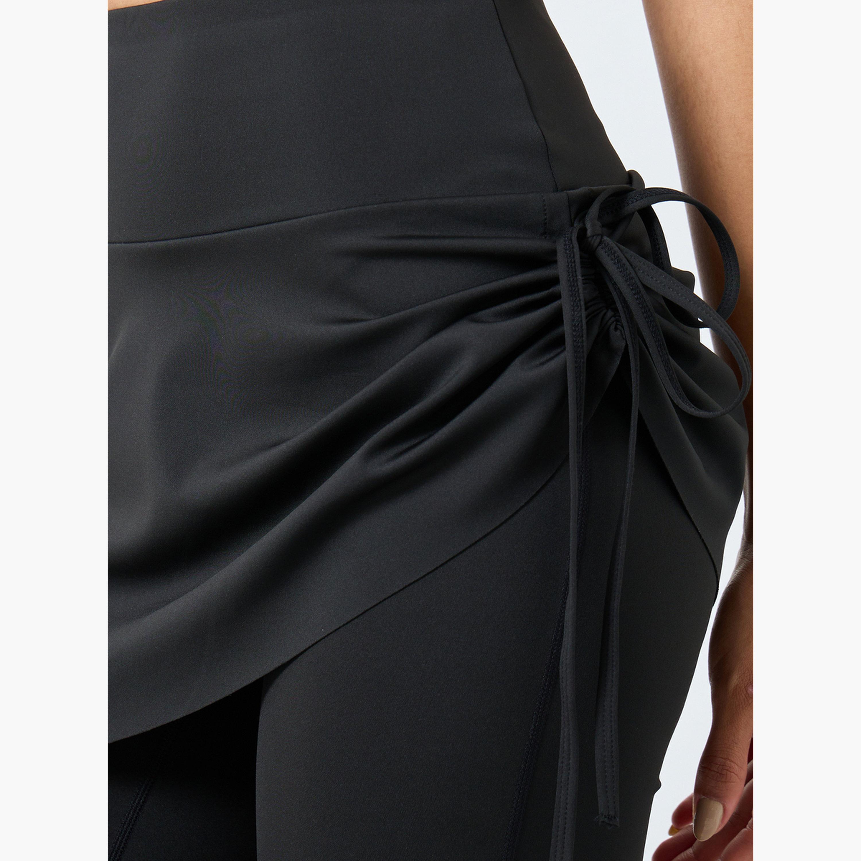 ستايلي - بنطال واسع تصميم 2 في 1 مع تنورة جانبية مكشكشة-women-clothing-sportswearandactivewear-bottoms-image-4