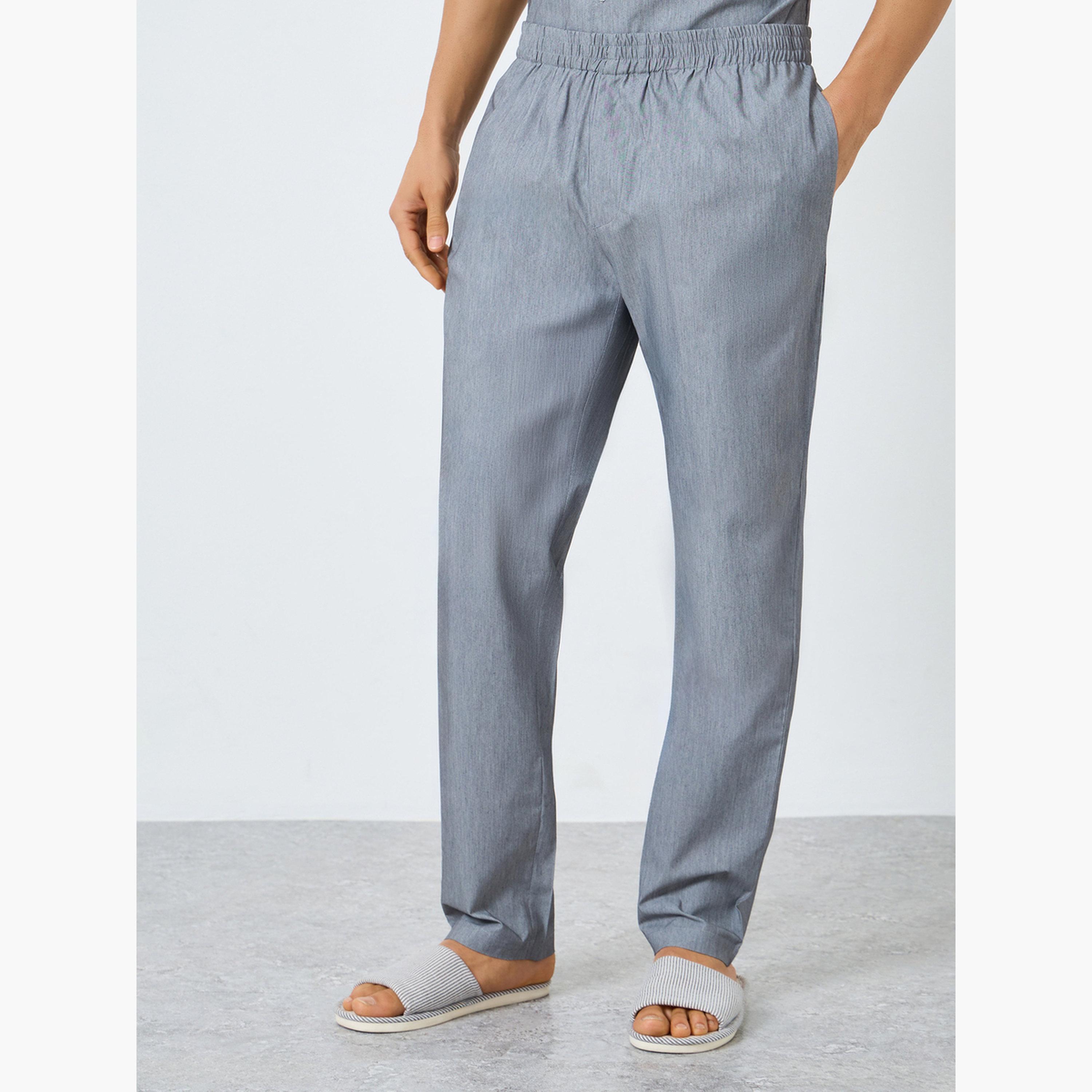 طقم بيجاما من بنطال وقميص بأزرار بقصة مريحة-men-clothing-nightwear-sets-image-4