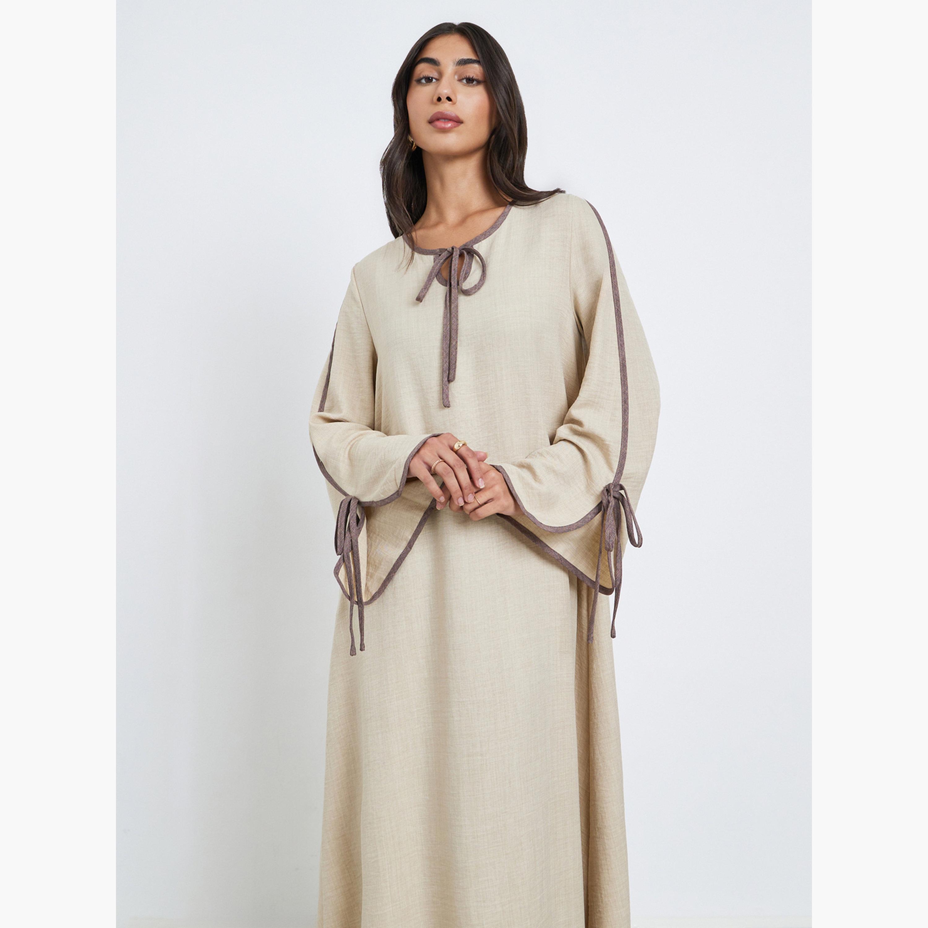 Amirah X Styli Beige Tie-Up Detail Jalabiya with Contrast Piping-women-arabicclothing-jalabiyas-image-2