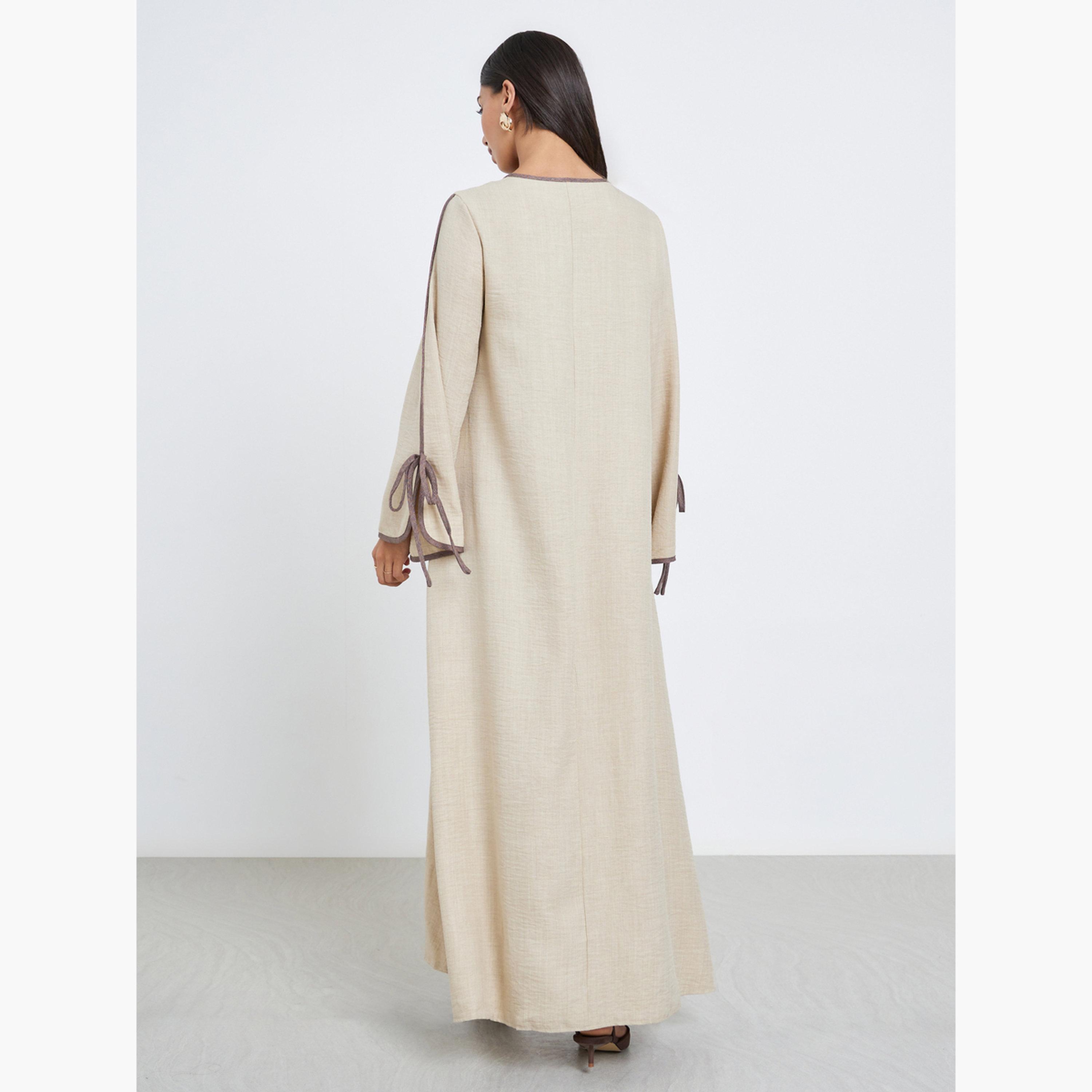 Amirah X Styli Beige Tie-Up Detail Jalabiya with Contrast Piping-women-arabicclothing-jalabiyas-image-3