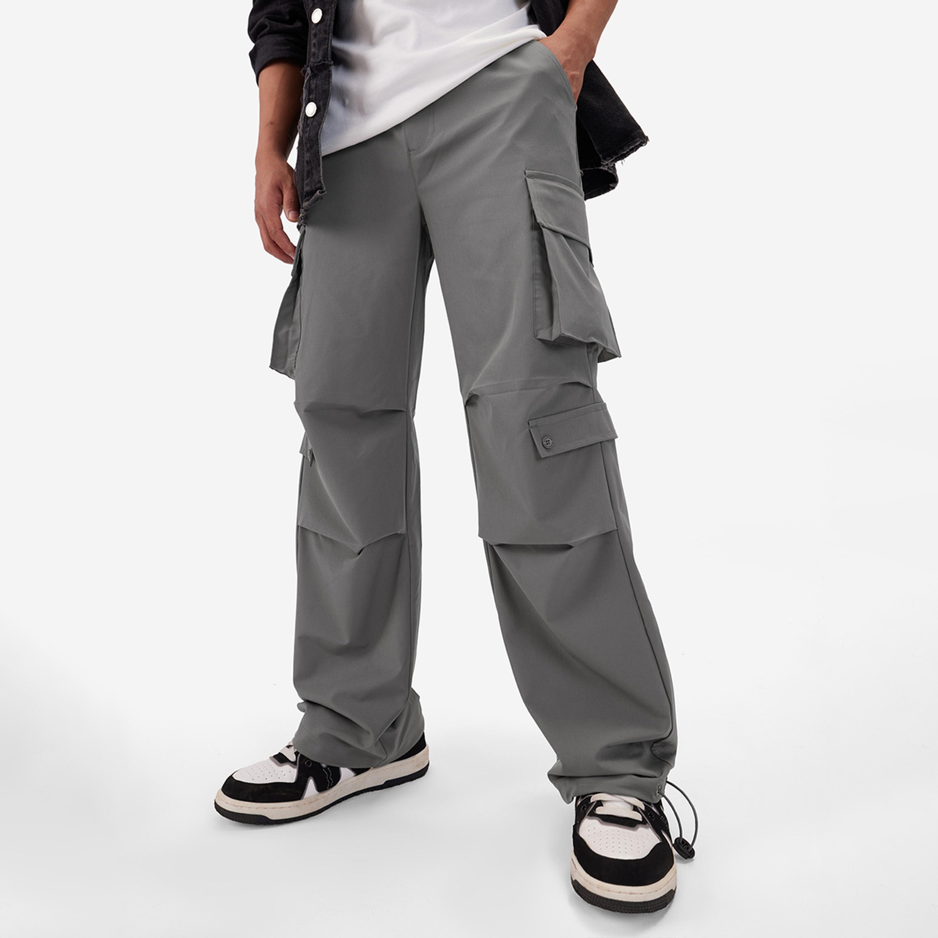 ذا سولد ستور × ستايلي - بنطال رجالي رمادي اللون مزود بجيوب ومظلات-men-clothing-bottoms-trousersandchinos-trousers-image-1