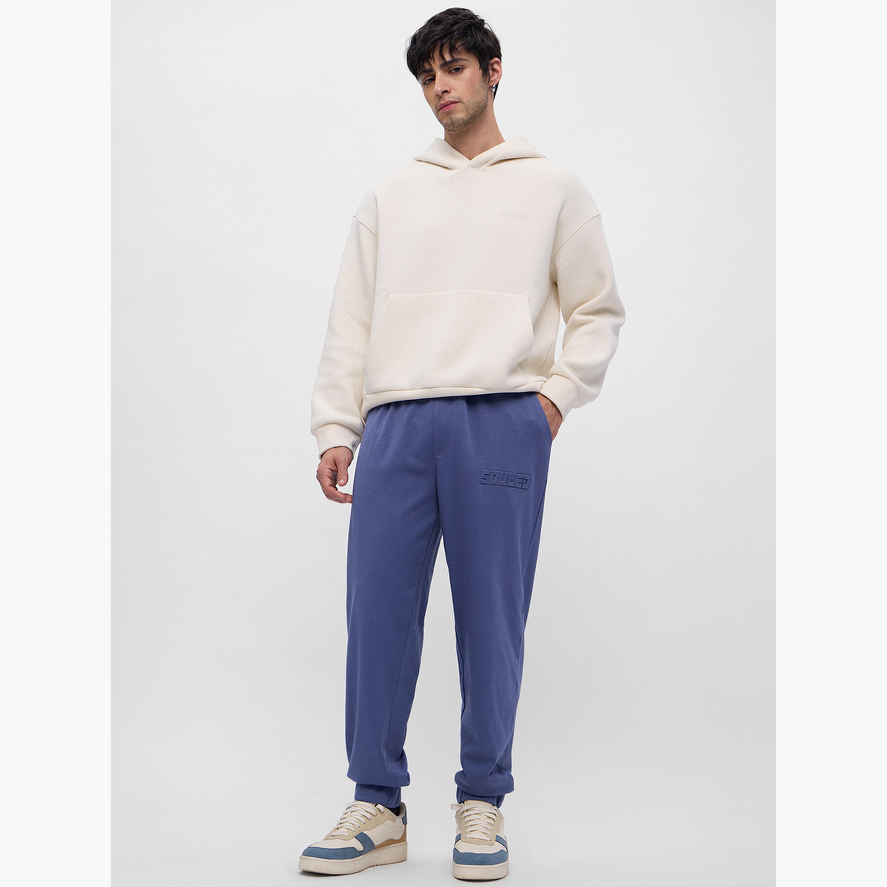 ذا سولد ستور × ستايلي - بنطال رياضي رجالي حجم كبير بتفاصيل منقوشة لون أزرق-men-clothing-bottoms-joggers-image-2