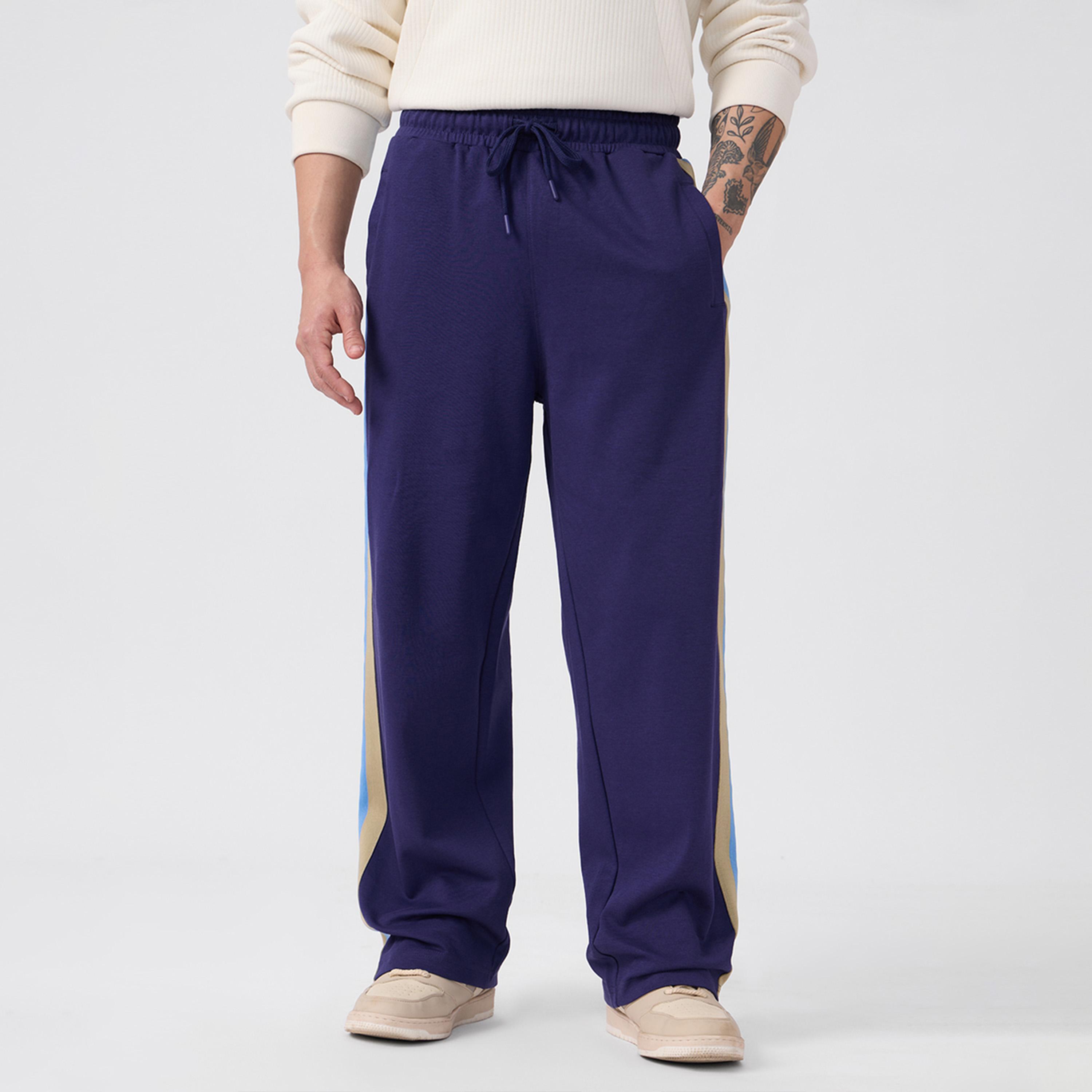 ذا سولد ستور × ستايلي - بنطال رياضي كوري رجالي مخطط جانبي لون أزرق-men-clothing-bottoms-joggers-image-1