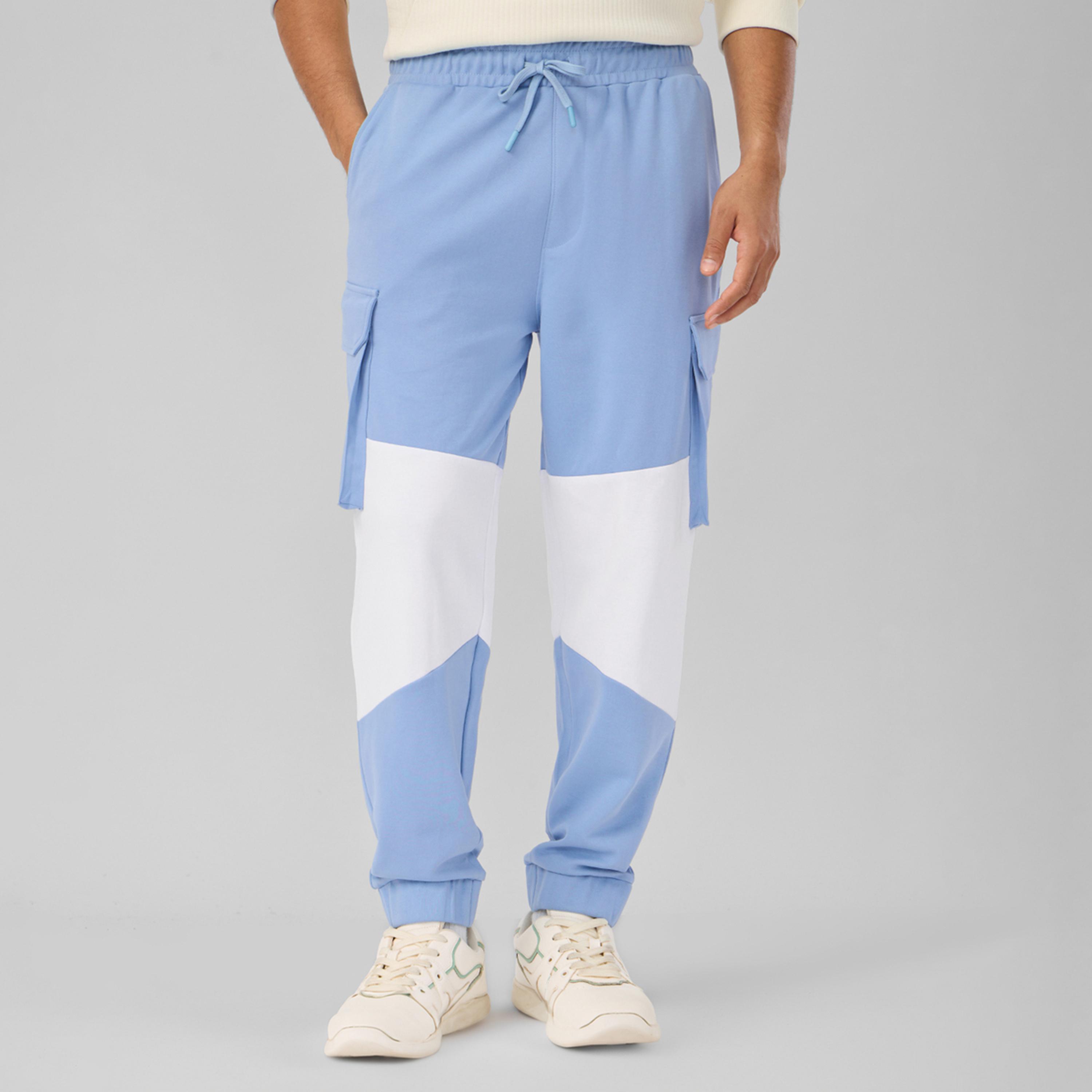 ذا سولد ستور × ستايلي - بنطال رياضي رجالي متعدد الاستخدامات لون أزرق-men-clothing-bottoms-joggers-image-1