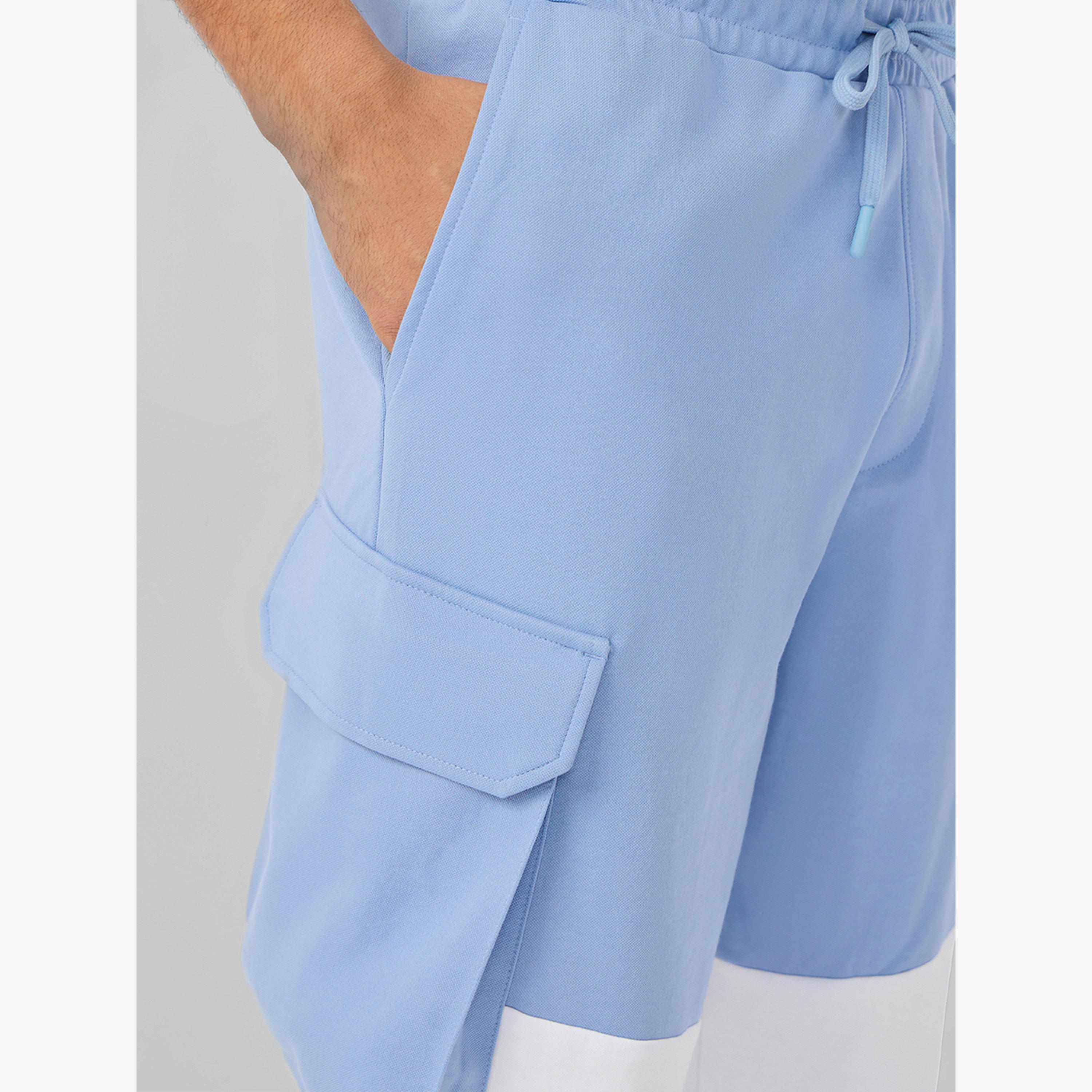 ذا سولد ستور × ستايلي - بنطال رياضي رجالي متعدد الاستخدامات لون أزرق-men-clothing-bottoms-joggers-image-5