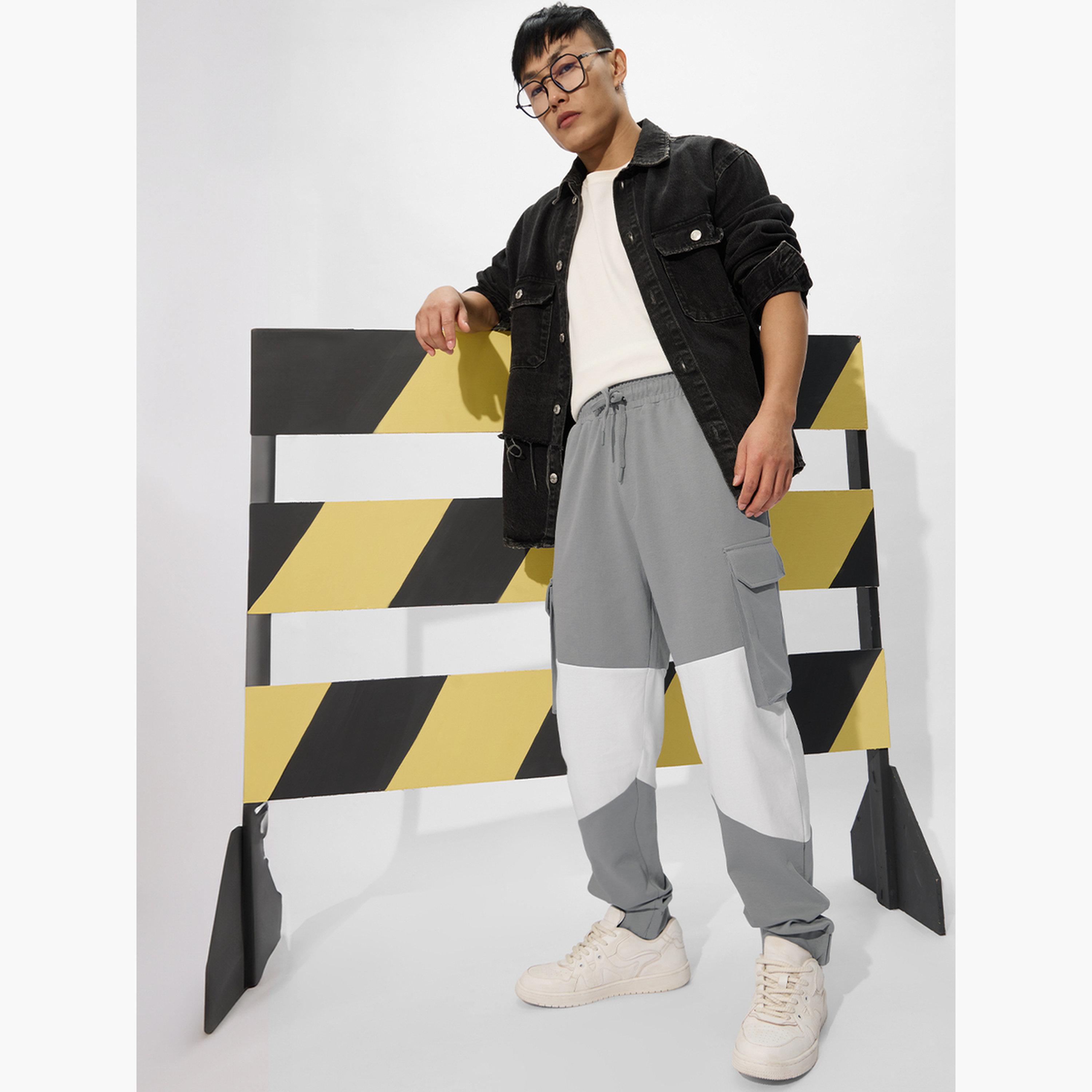 ذا سولد ستور × ستايلي - بنطال رياضي رجالي متعدد الاستخدامات لون رمادي-men-clothing-bottoms-joggers-image-2