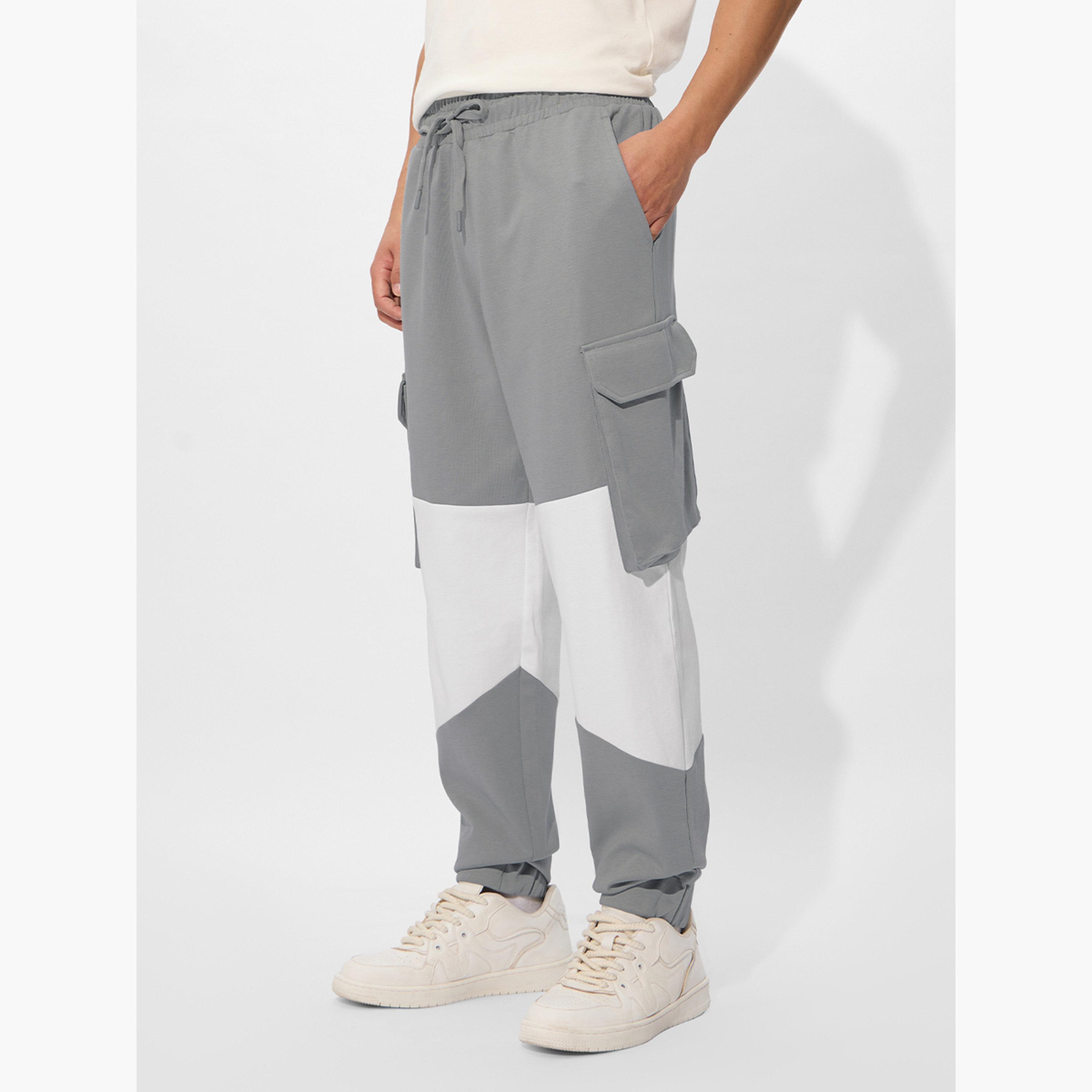 ذا سولد ستور × ستايلي - بنطال رياضي رجالي متعدد الاستخدامات لون رمادي-men-clothing-bottoms-joggers-image-3
