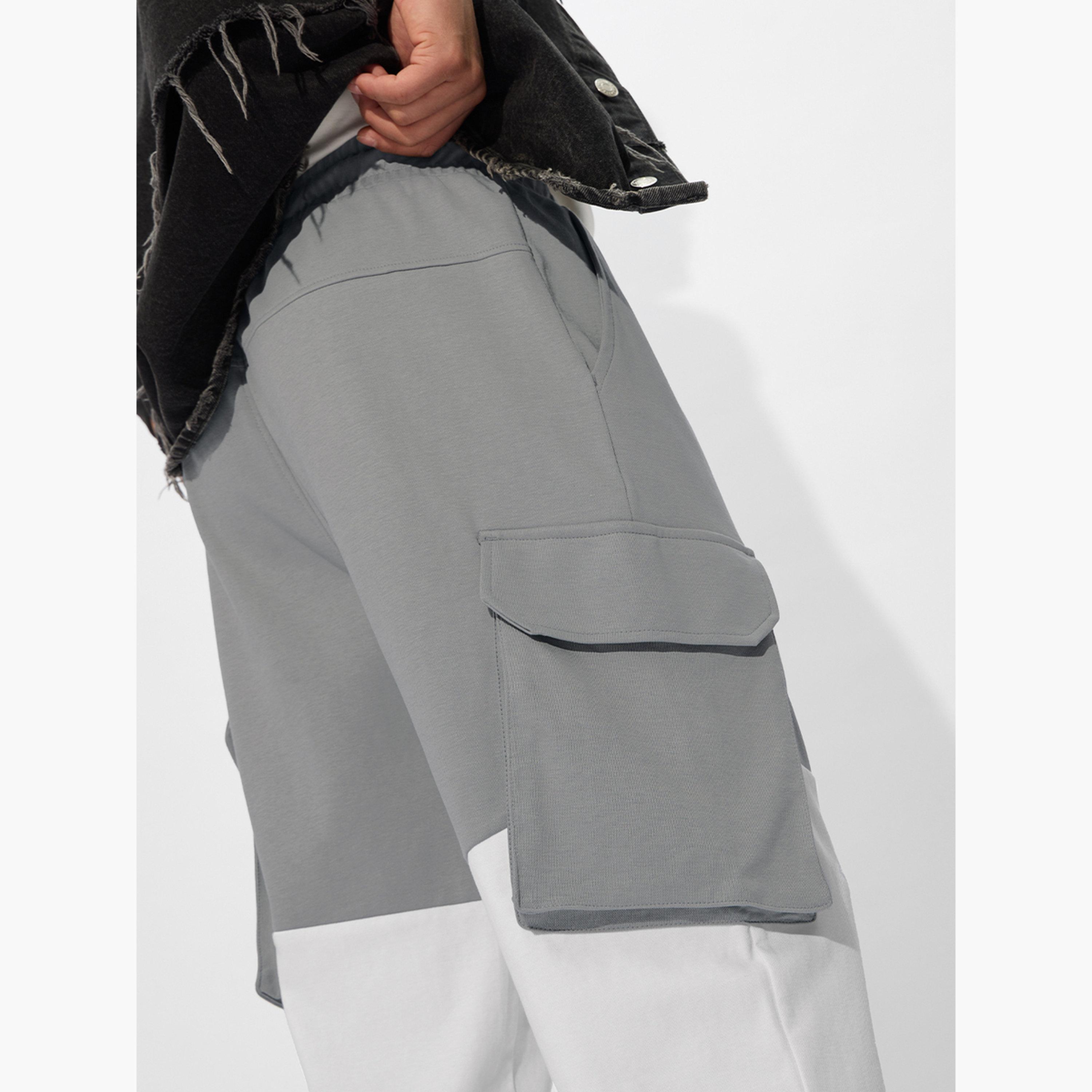 ذا سولد ستور × ستايلي - بنطال رياضي رجالي متعدد الاستخدامات لون رمادي-men-clothing-bottoms-joggers-image-5