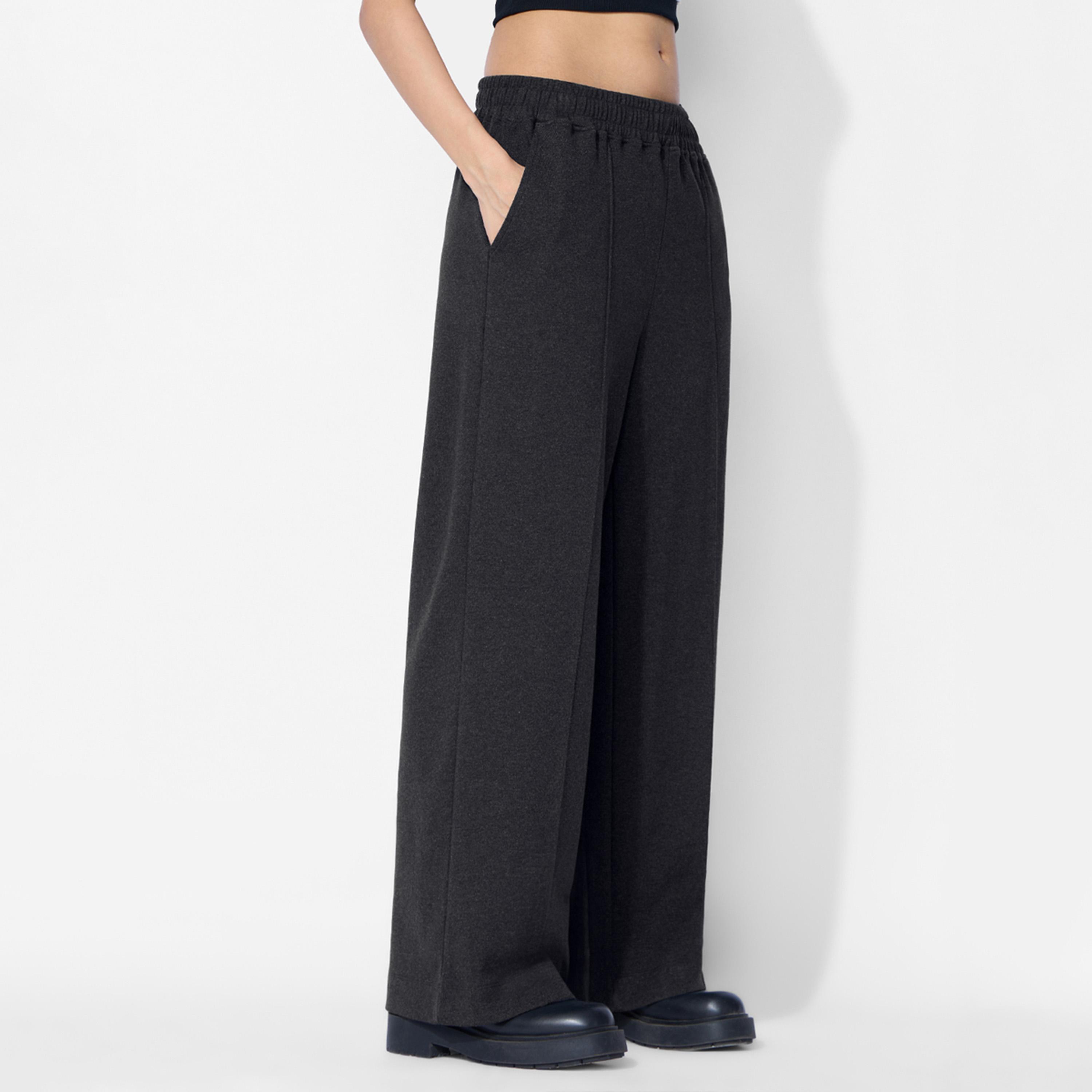ذا سولد ستور × ستايلي - بنطال رياضي واسع الساق لون أسود-women-clothing-bottoms-joggers-image-1