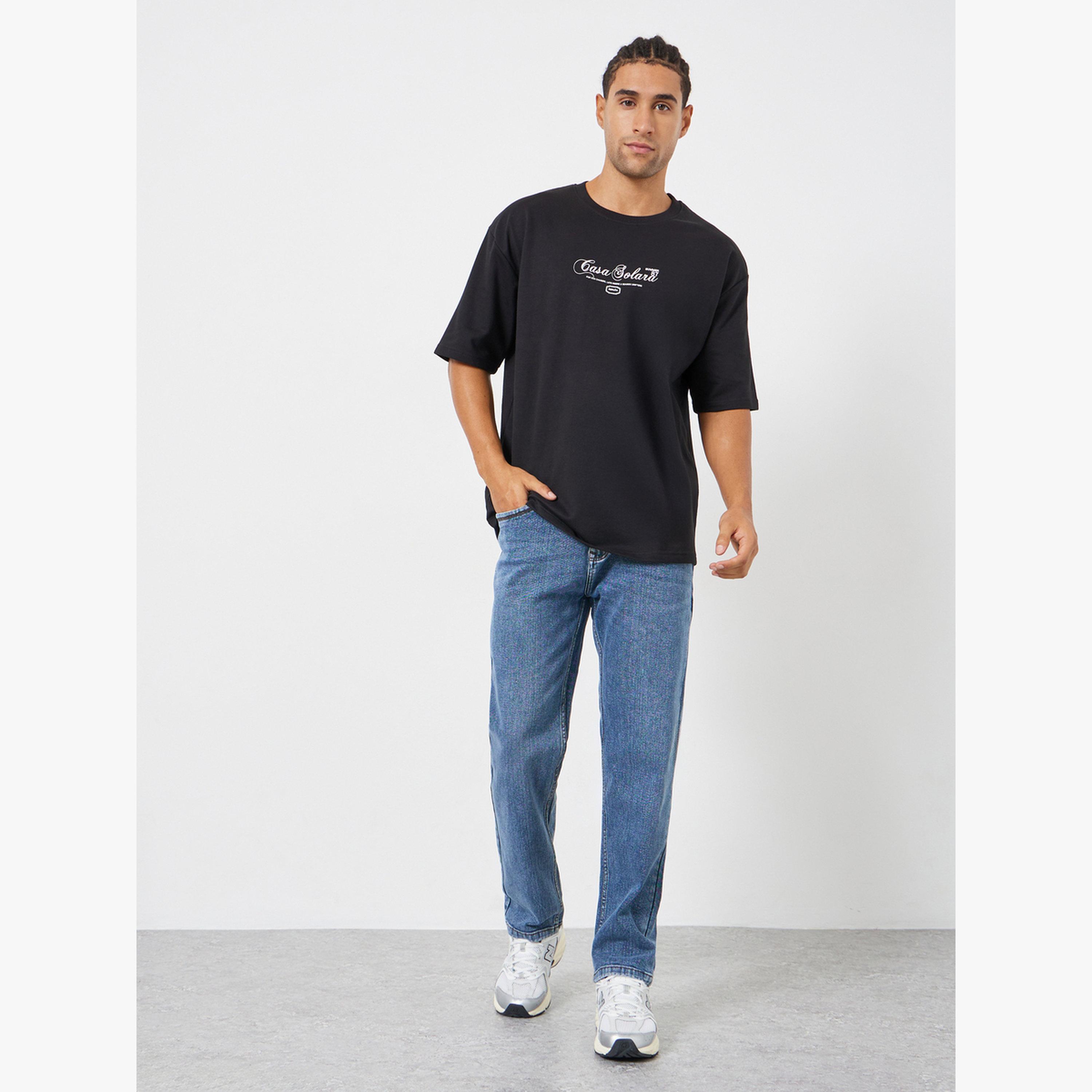 بنطال جينز قصة عادية غسيل متوسط-men-clothing-bottoms-jeans-image-2