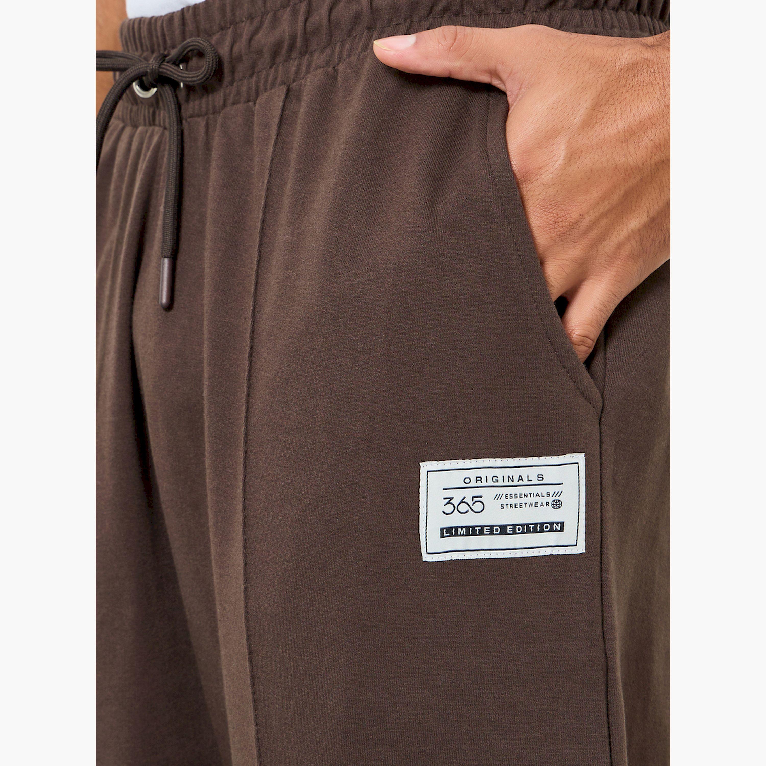 جوغر بأرجل واسعة وتفاصيل محزوزة-men-clothing-bottoms-joggers-image-3