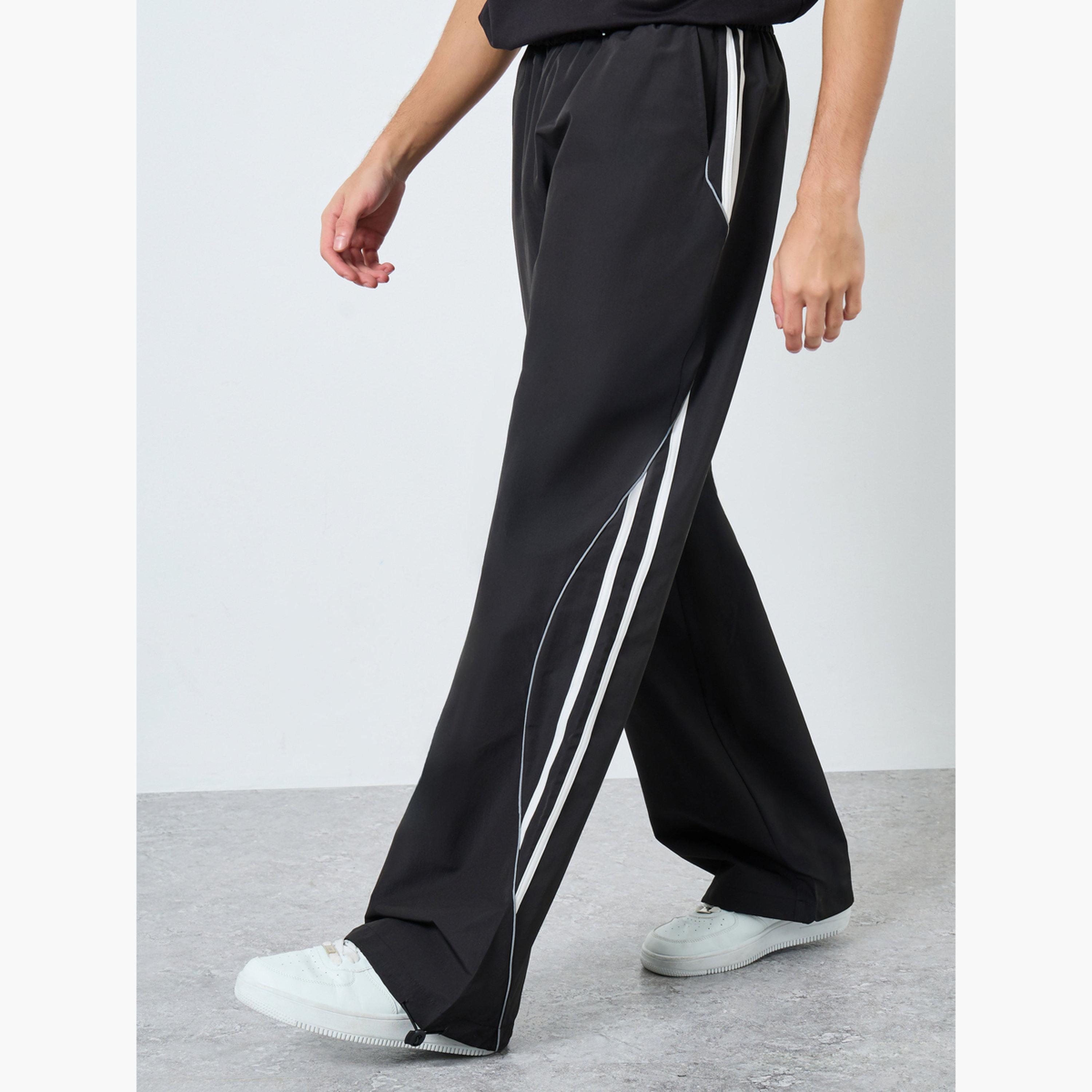 ستايلي - بنطال رياضي بقص وحياكة لوحة بتفاصيل مخططة للرجال-men-clothing-bottoms-joggers-image-1