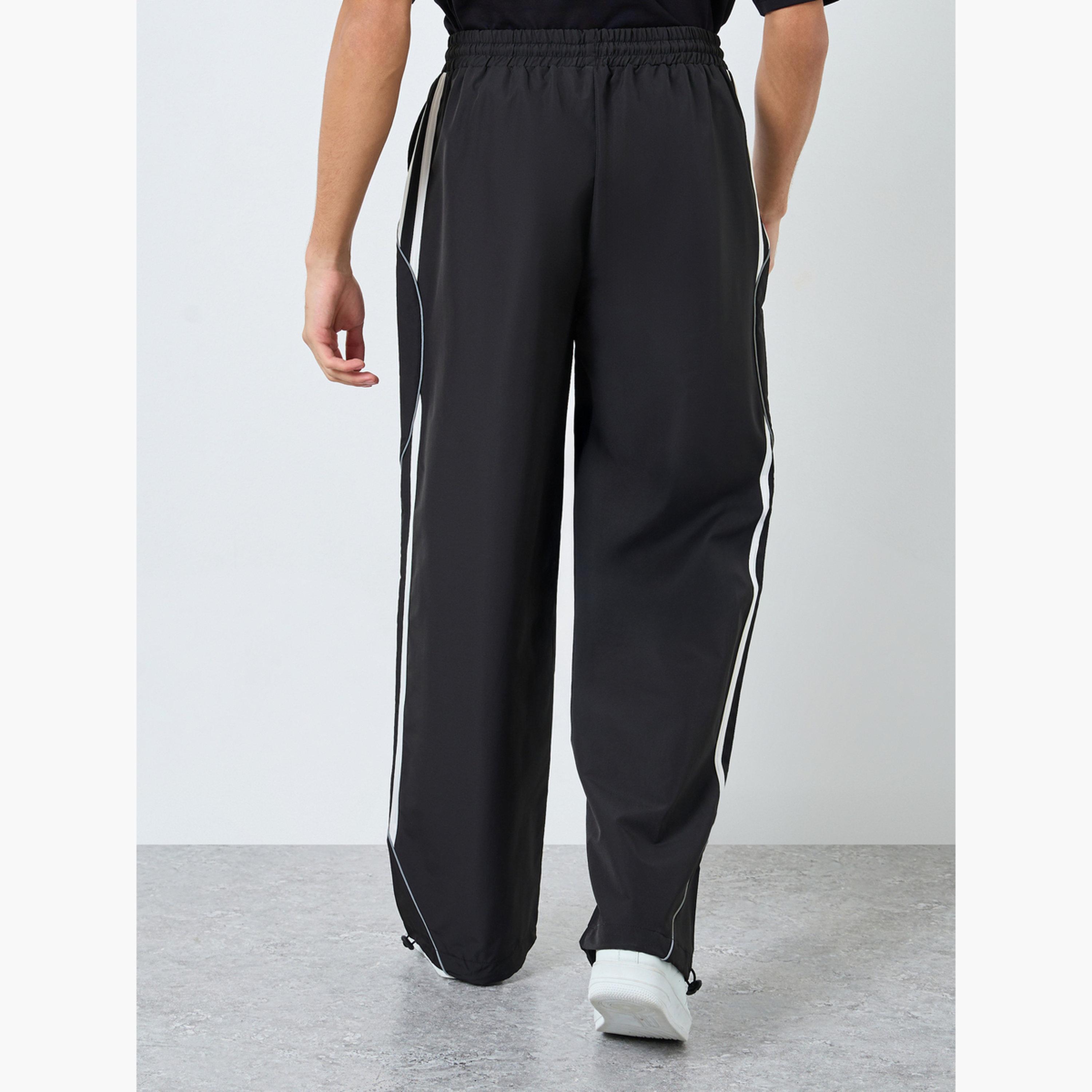 ستايلي - بنطال رياضي بقص وحياكة لوحة بتفاصيل مخططة للرجال-men-clothing-bottoms-joggers-image-4