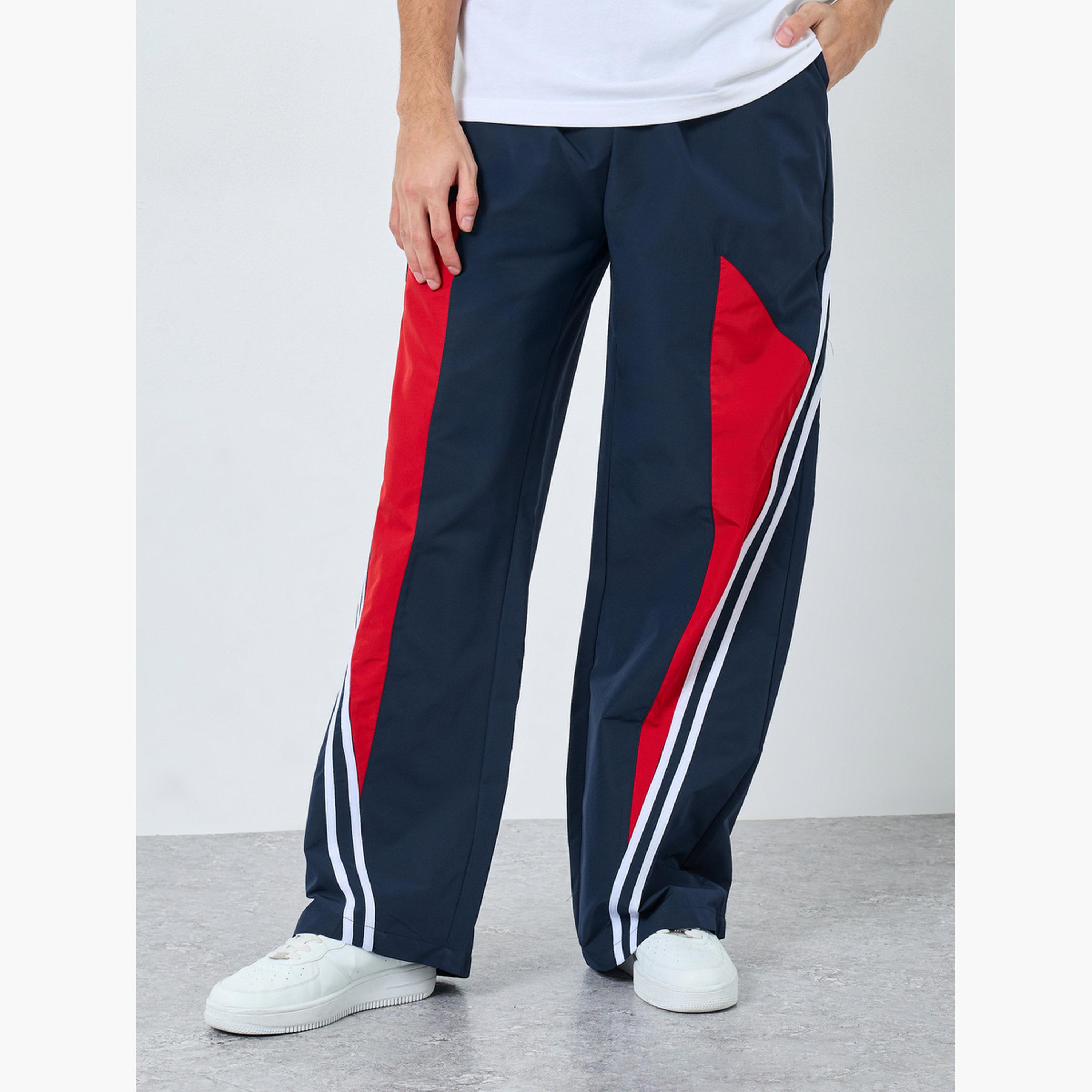 Styli Men Cut and Sew Panel with Striped Detail Joggers-men-clothing-sportswearandactivewear-bottoms-joggers-image-1