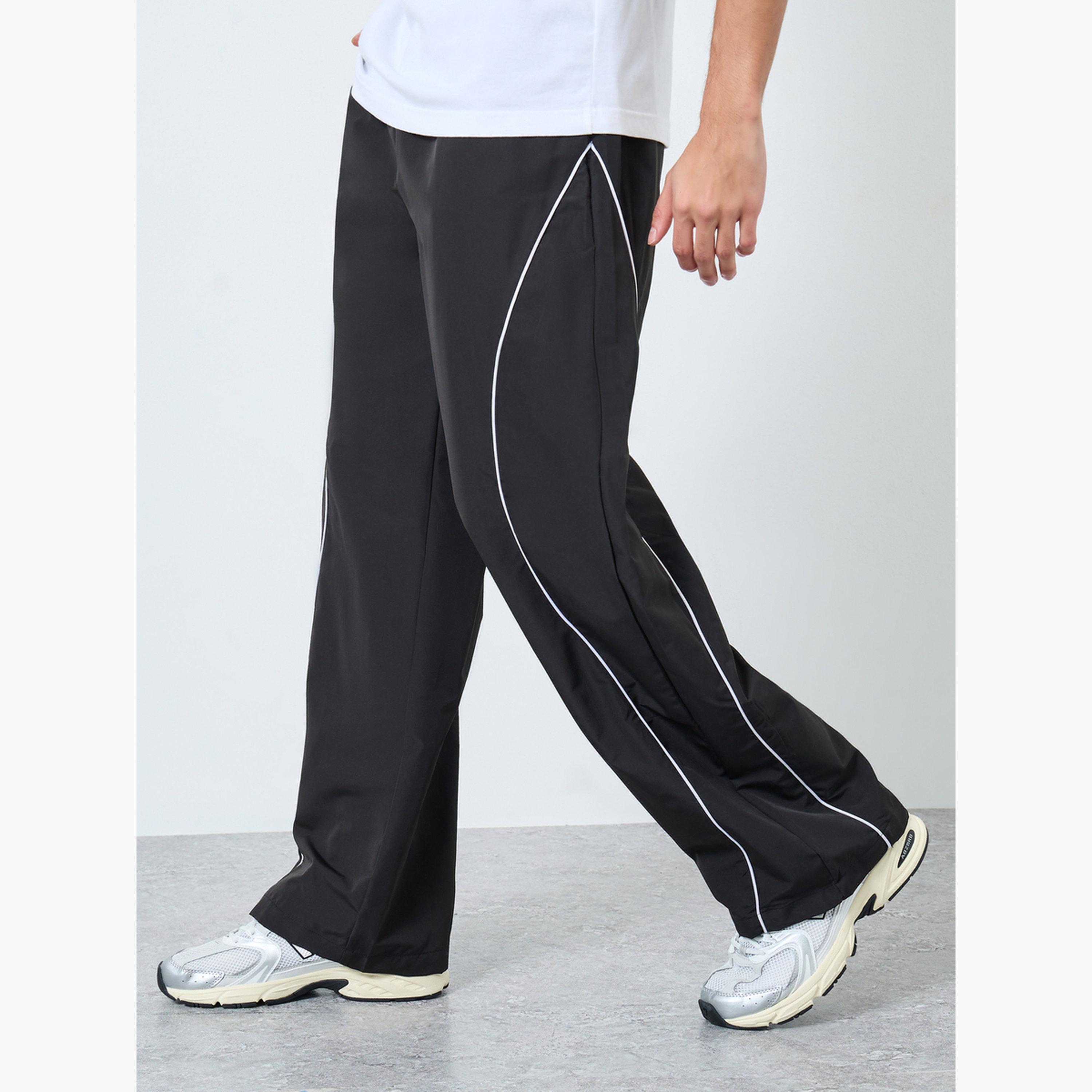 ستايلي - بنطال رياضي بقص وحياكة لوحة مع أنابيب عاكسة للرجال-men-clothing-sportswearandactivewear-bottoms-joggers-image-1
