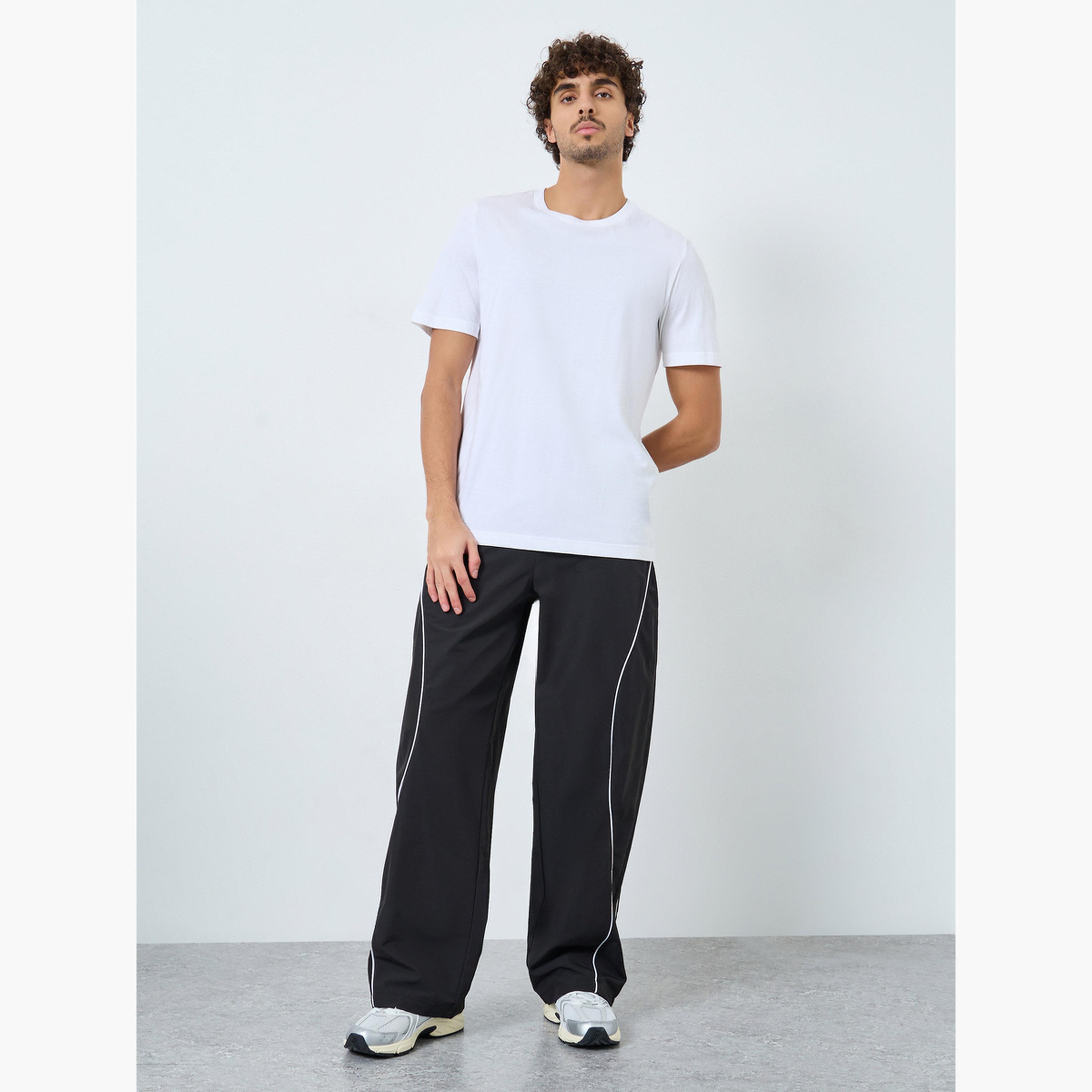 ستايلي - بنطال رياضي بقص وحياكة لوحة مع أنابيب عاكسة للرجال-men-clothing-sportswearandactivewear-bottoms-joggers-image-2