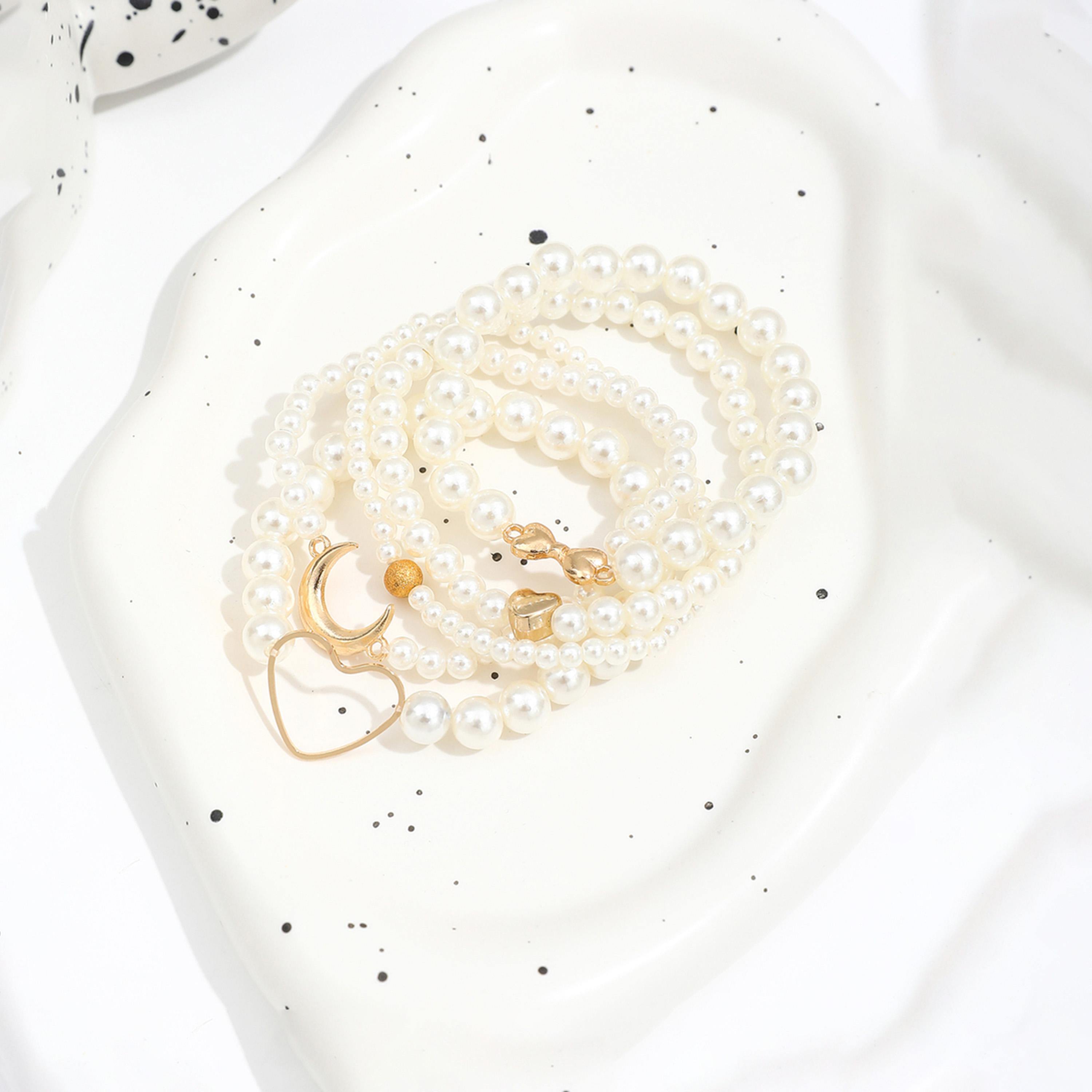 تيك تو - مجموعة من 5 أساور مزينة بقلب من اللؤلؤ الصناعي-women-watchesandjewellery-jewellery-banglesandbracelets-image-1