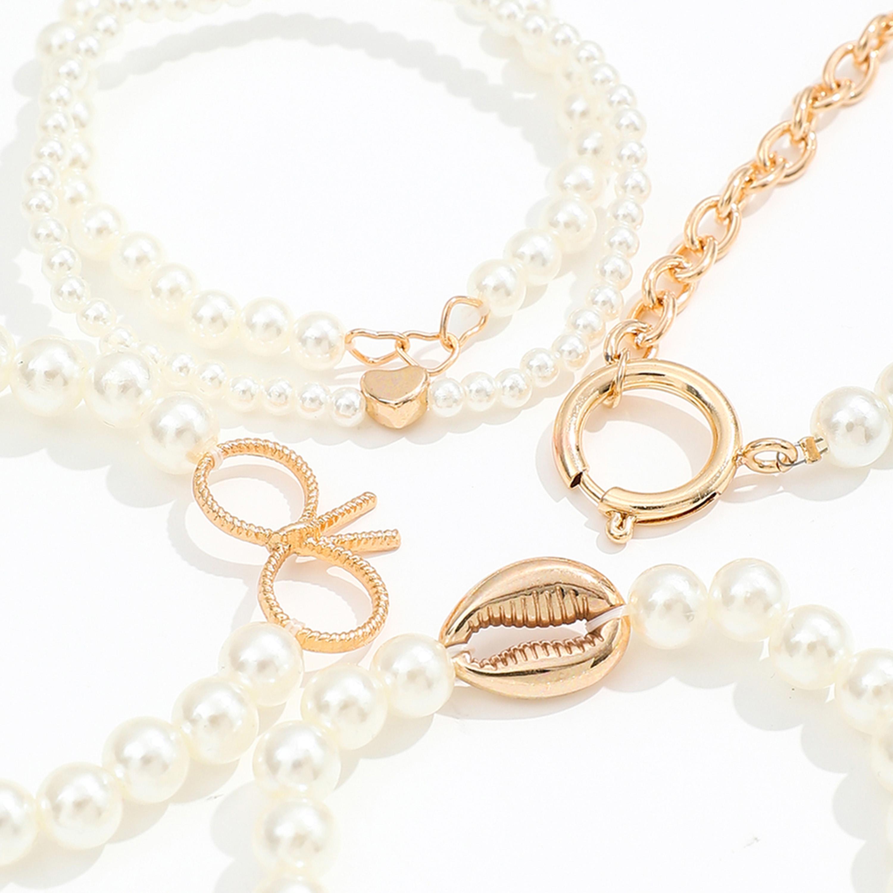 تيك تو - طقم 5 أساور من اللؤلؤ الصناعي-women-watchesandjewellery-jewellery-banglesandbracelets-image-4