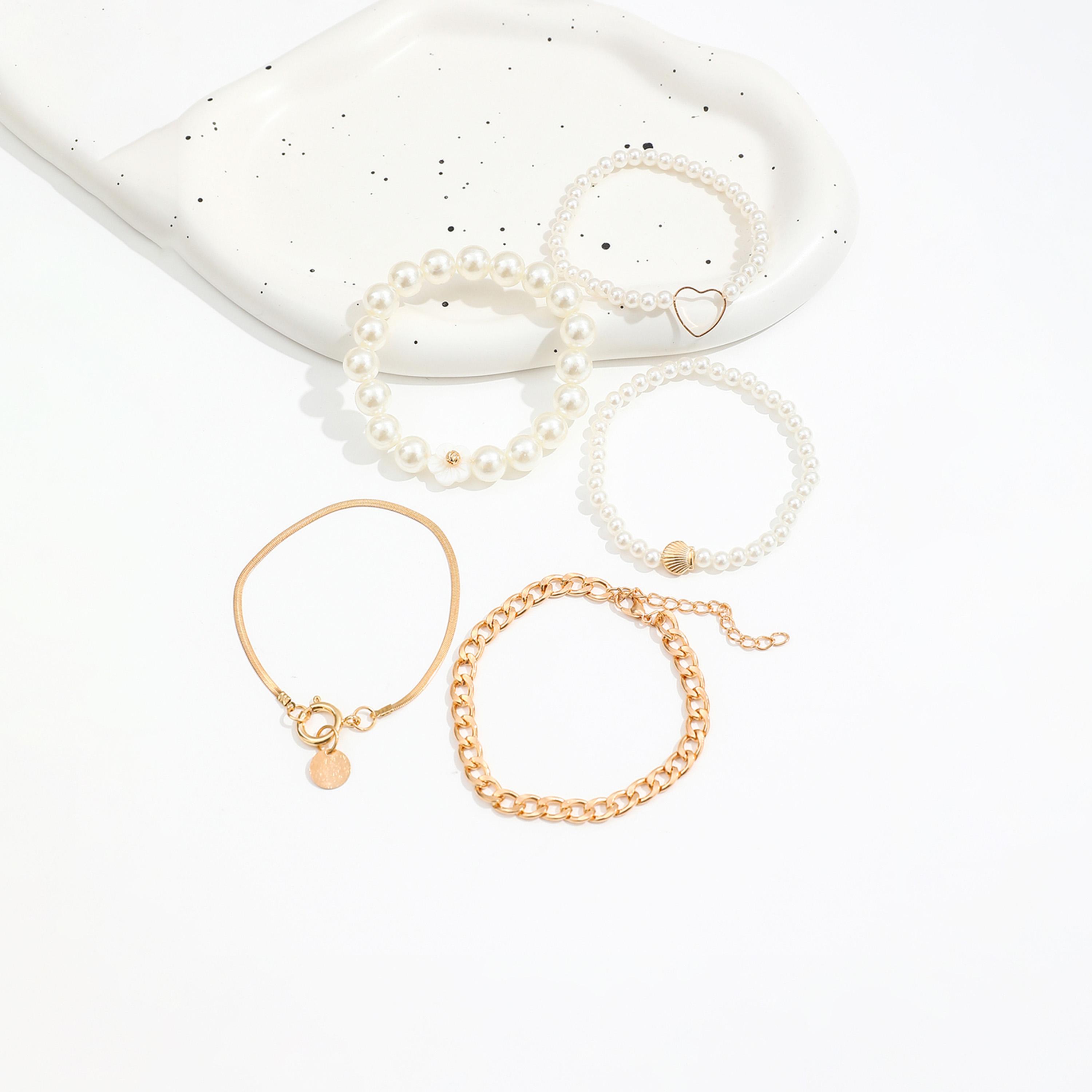 تيك تو - مجموعة من 5 أساور مزينة باللؤلؤ الصناعي-women-watchesandjewellery-jewellery-banglesandbracelets-image-1
